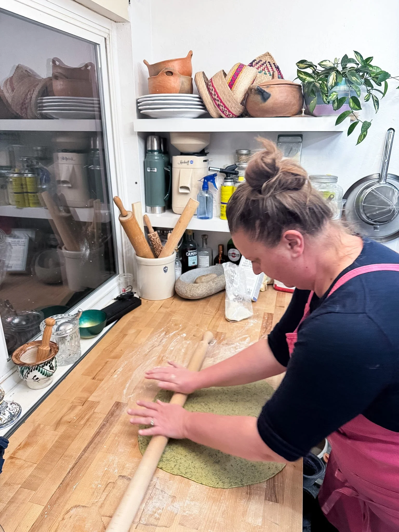 Chef Andreya rolling out sfoglino, pasta dough for lasagne