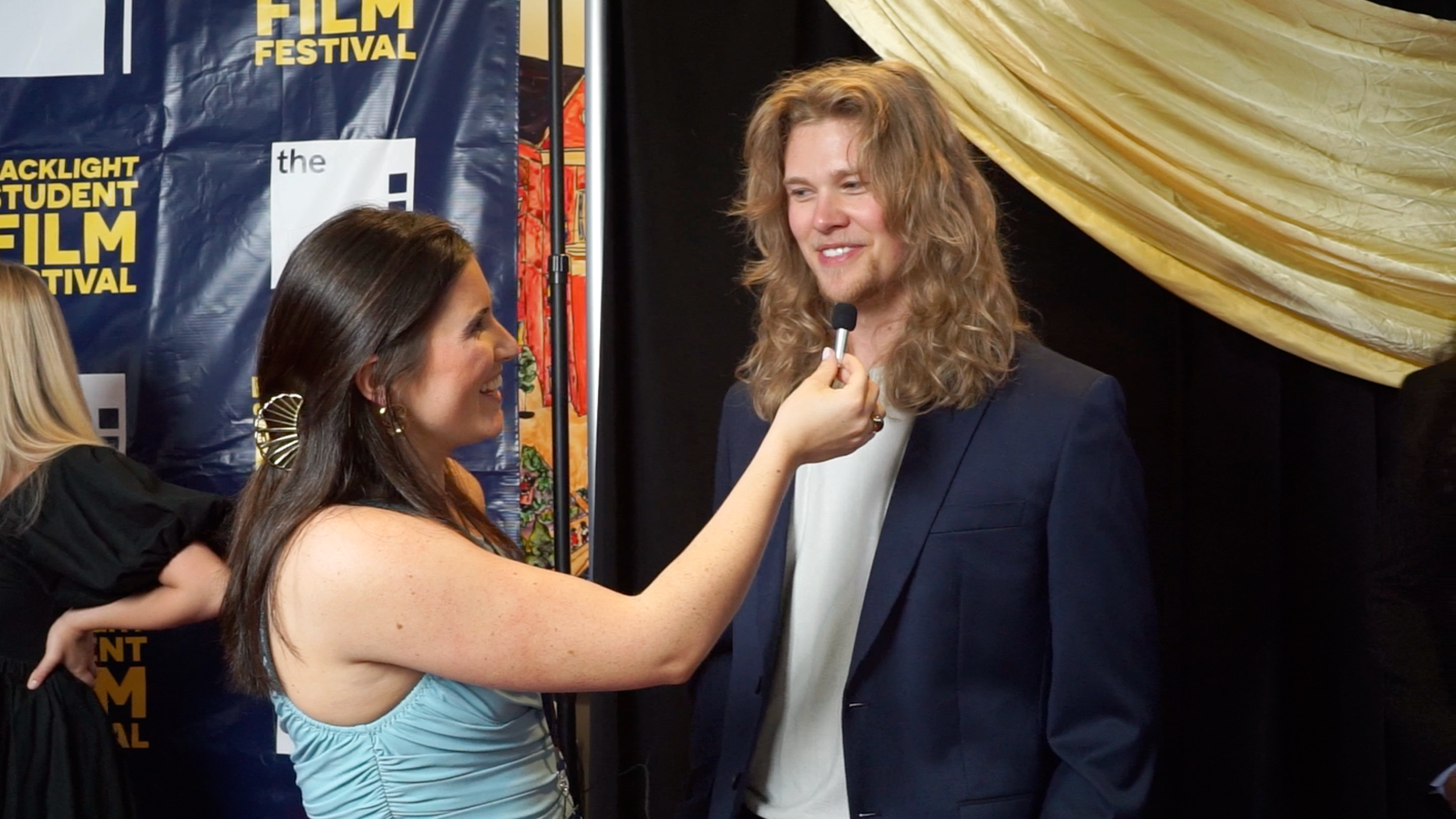 Reporting from the red carpet at the Backlight Student Film Festival at the University of Georgia, conducting live interviews with student filmmakers.