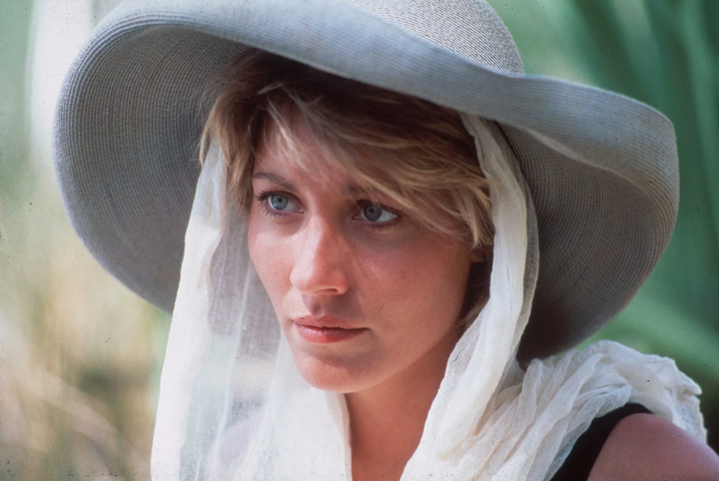 1985-RF-CD-Sue-in-hat-and-white-scarf-looking-off-camera-beautiful.jpg