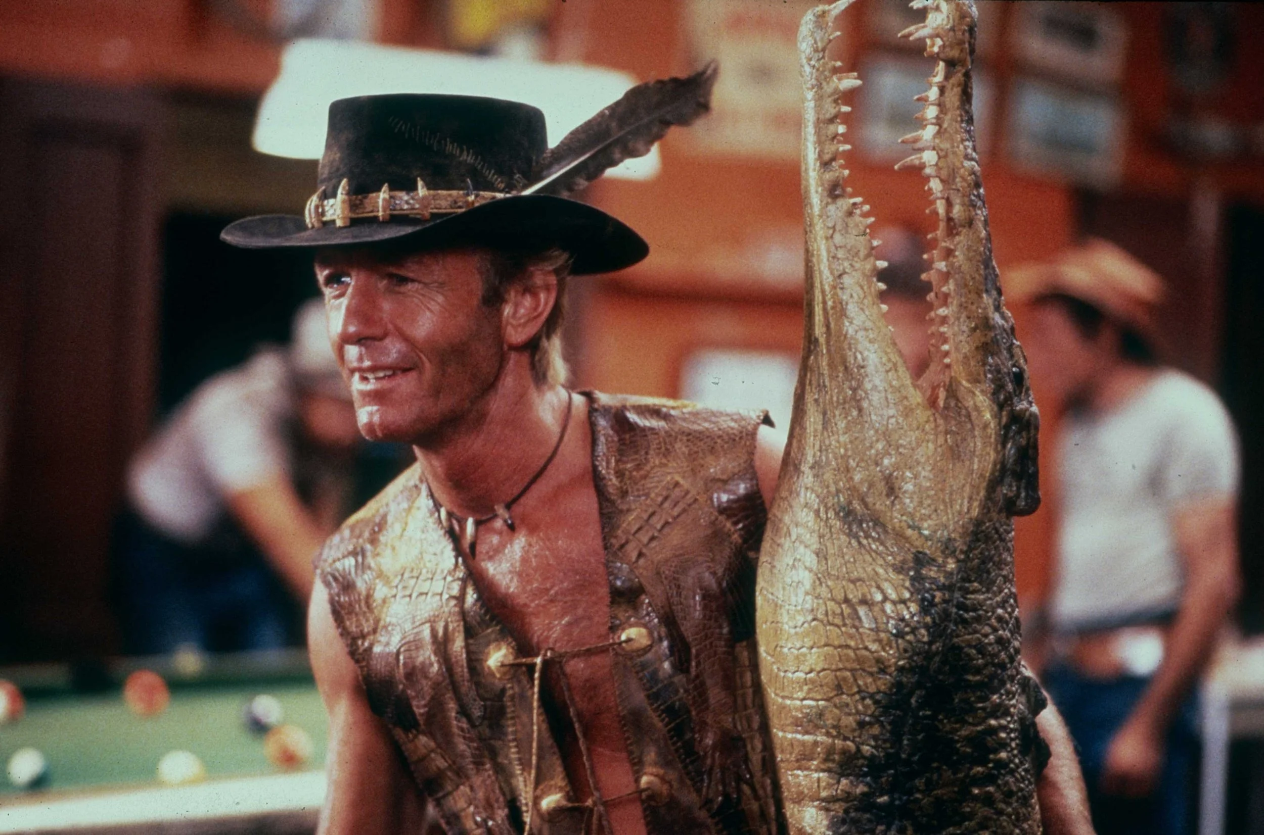 1985-RF-CD-HERO-Mick-Dundee-MIck-with-Cyril-the-Croc-Enters-Walkabout-Creek-.jpg