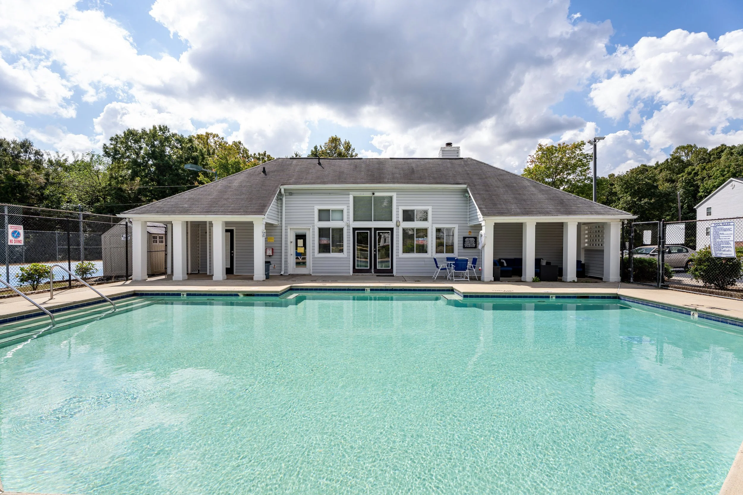 Pool with sundeck and chairs
