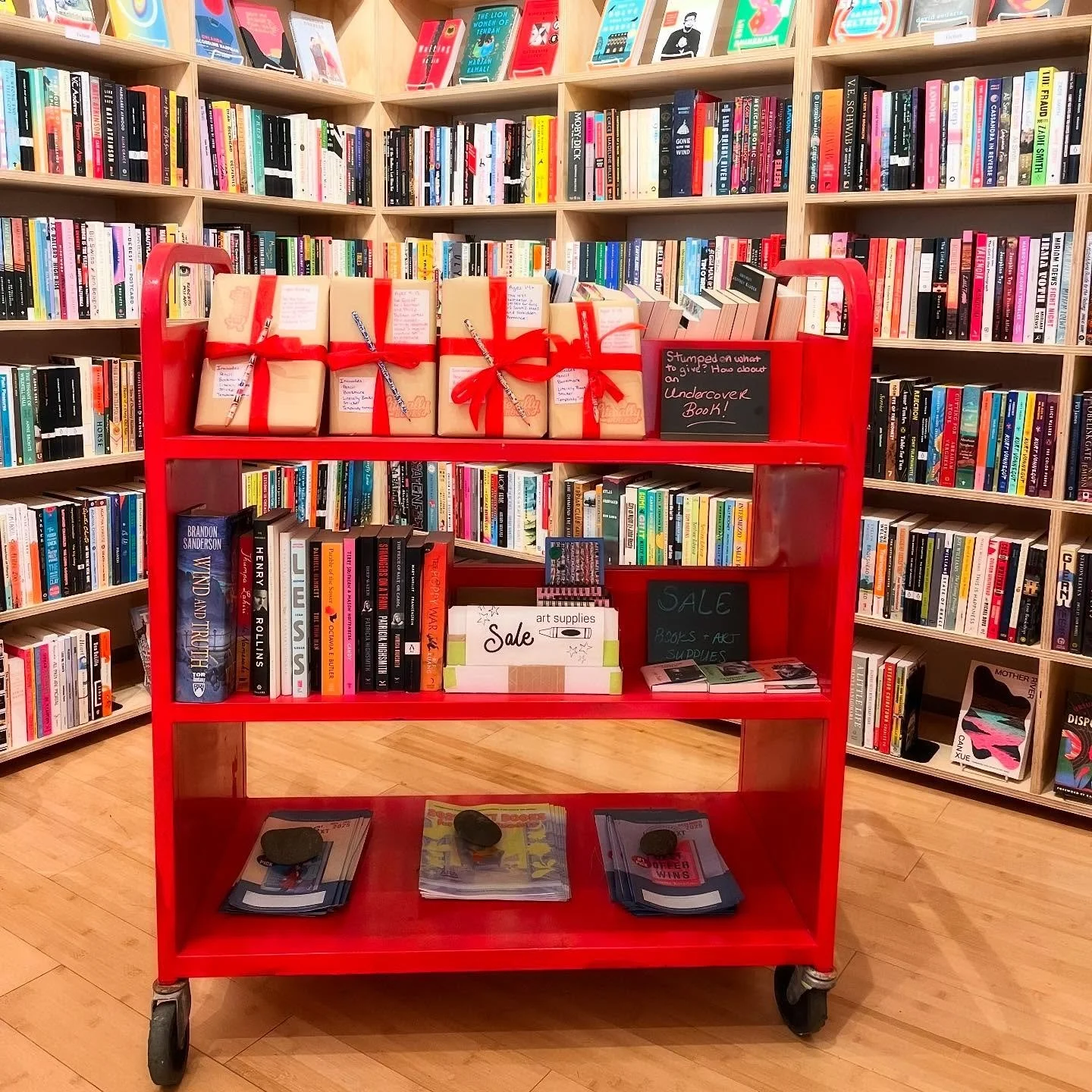 Shop small, shop local! Our book cart is staying inside today keeping warm. On it is some Undercover Books (basically blind date with a book but for middle age) and sale items. We are here until 6! #independentbookstore #newpaltz
