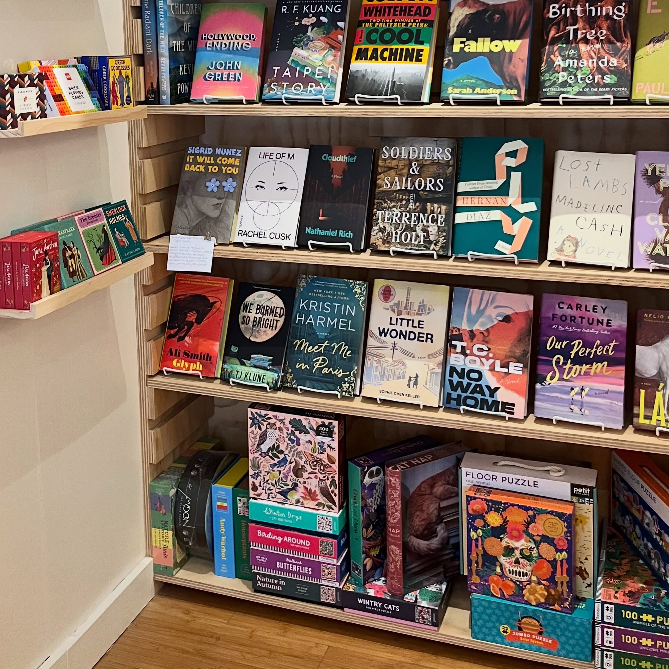 Besides books we have playing cards and puzzles to get you through the rainy weekend!