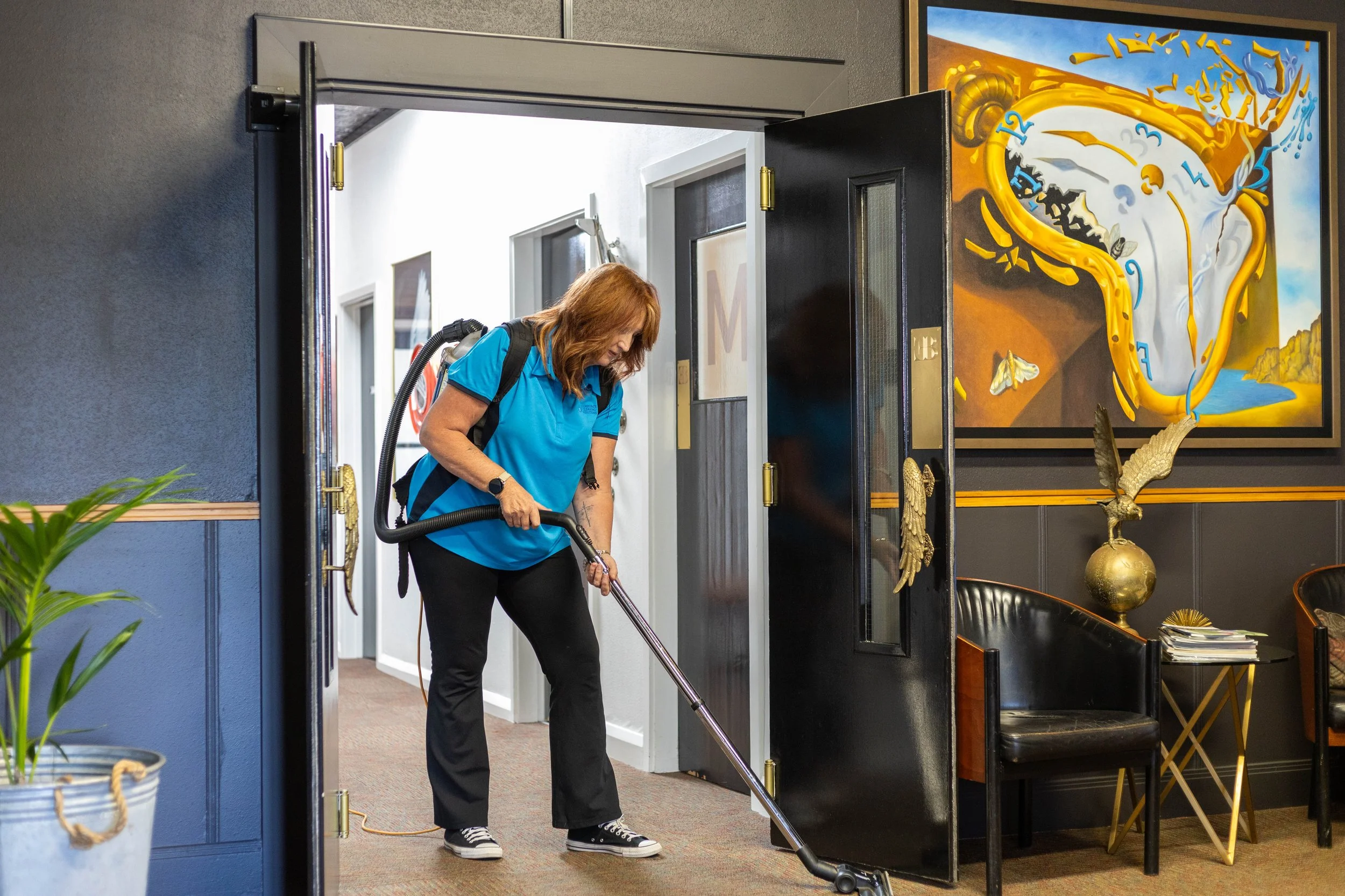 Lyndell vacuum doorway.jpg