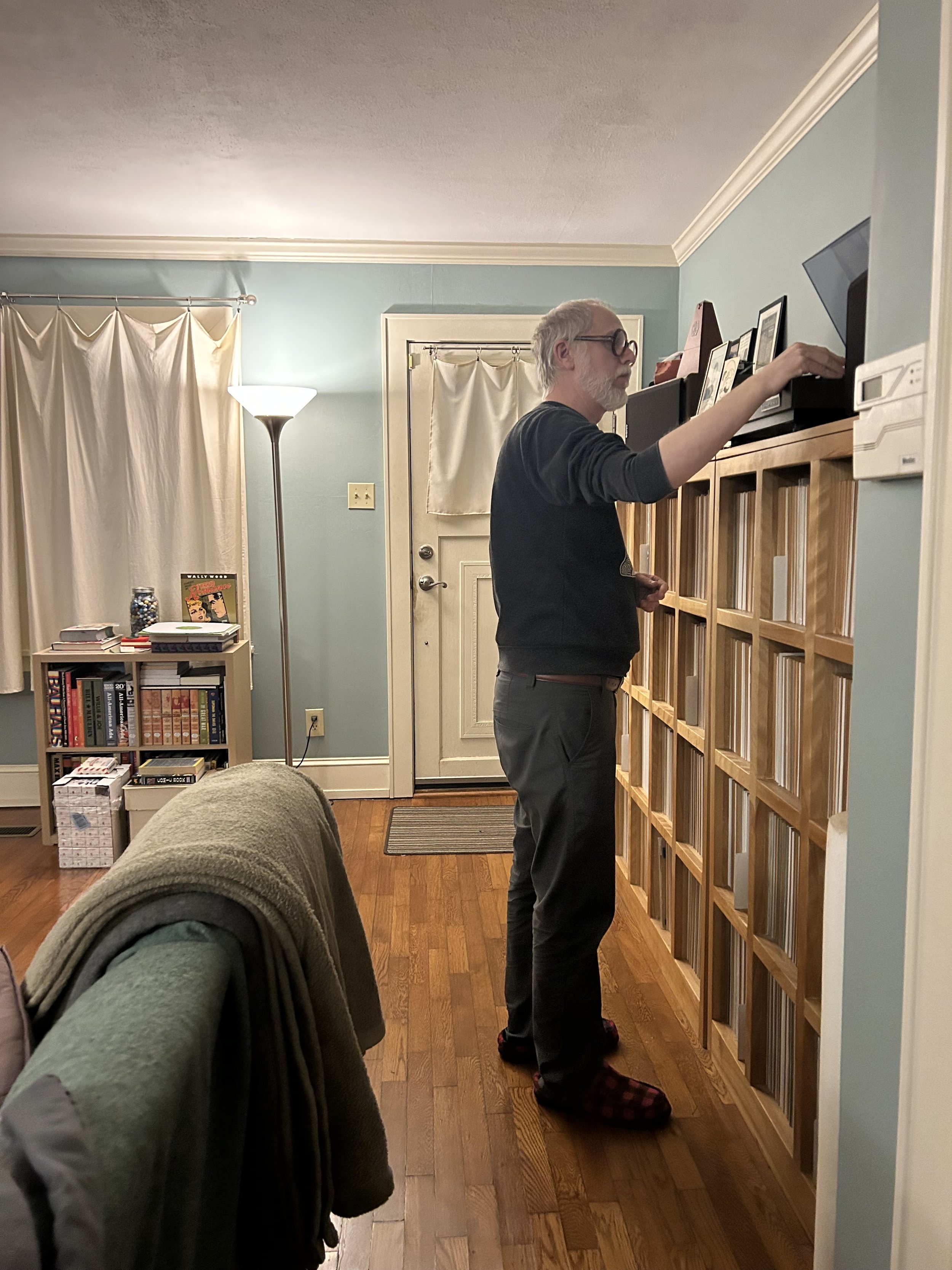 Steve looks through his record collection.