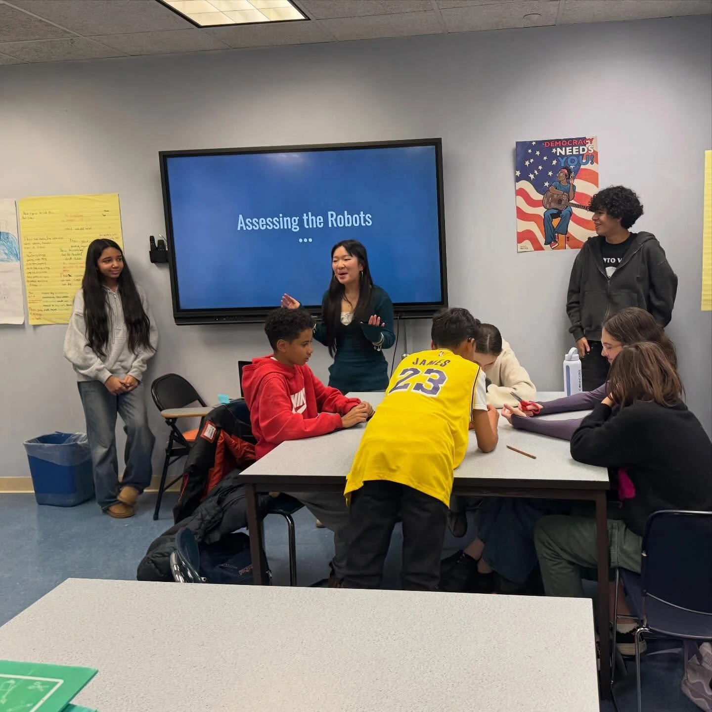 Our amazing robotics team working with our 7th grader students in advisory, teaching them about coding and robots. 🤖 🐝