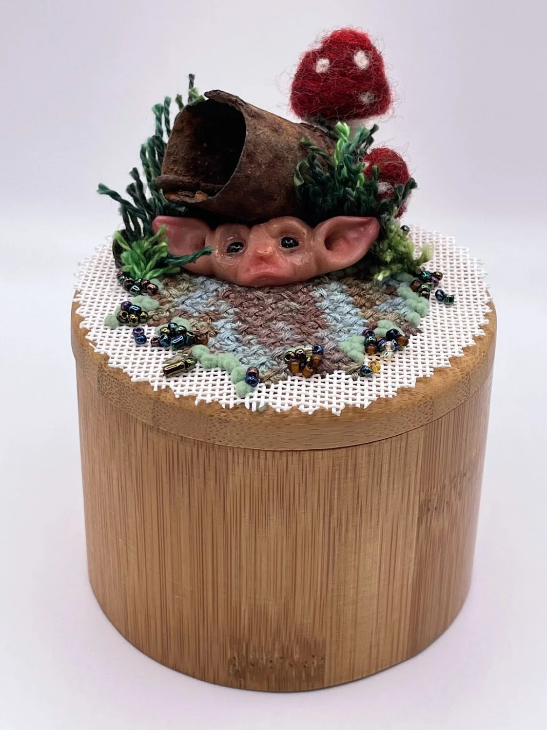 "Bellringer" - worked with found rusted bell, felted mushrooms, cotton, wool, and silk threads, beads, hand sculpted Trow by John Lee. -sold-
