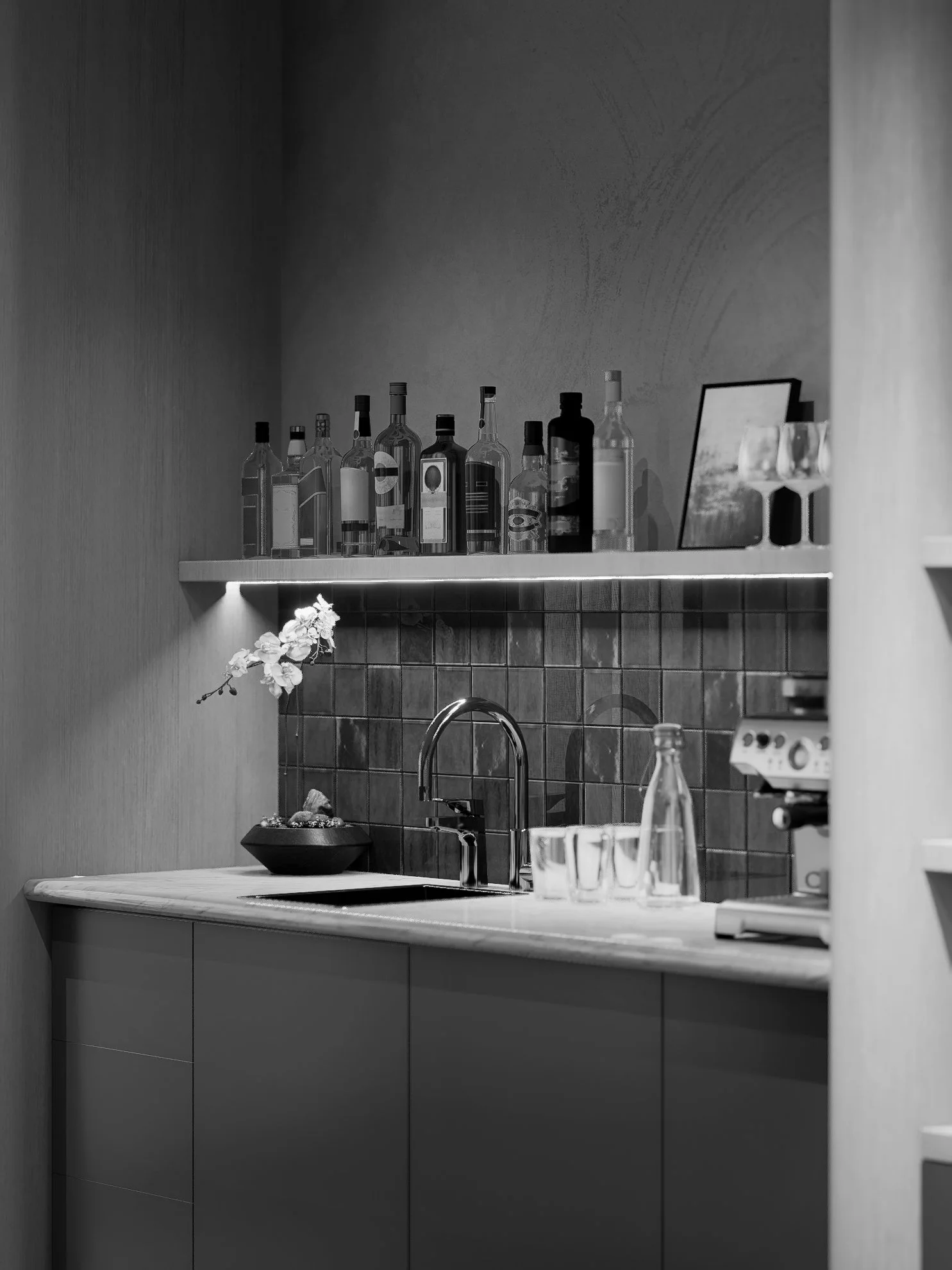 A modern kitchen with a remove backsplash, a shelf with bottles, and a sink with a glass and bottle nearby.