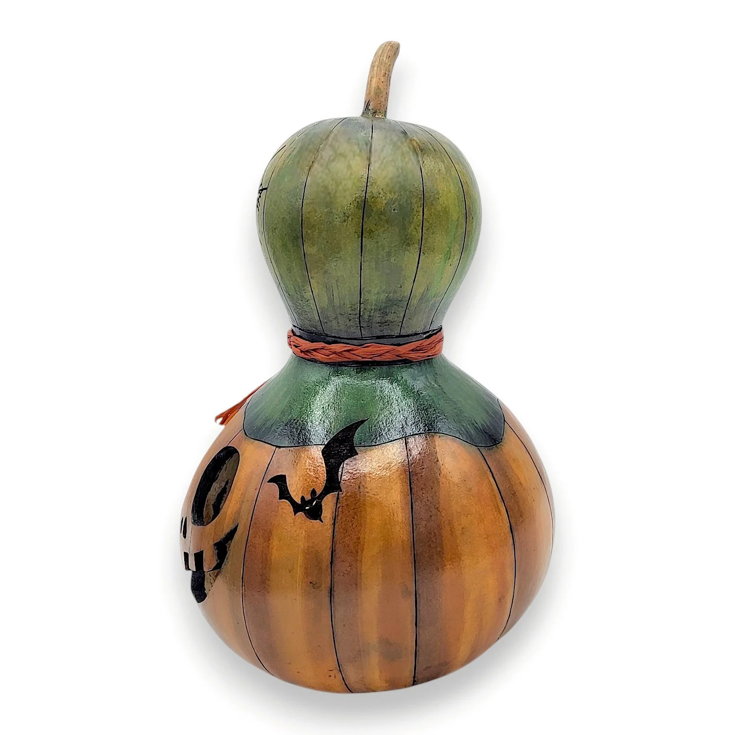 Side angle of bottle gourd jack-o'-lantern showing curved shape, flying bat, wood burned details, and layered autumn tones in orange, brown, and green.