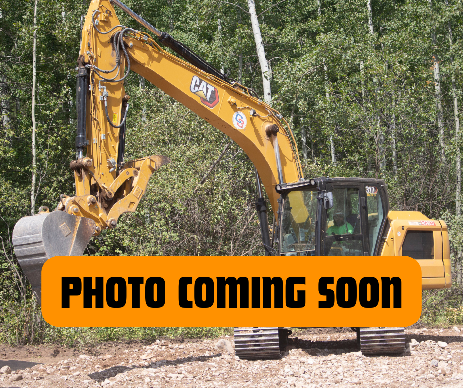 Yellow Caterpillar excavator working on a construction site with trees in the background, overlaid with orange text reading 'Photo coming soon'.