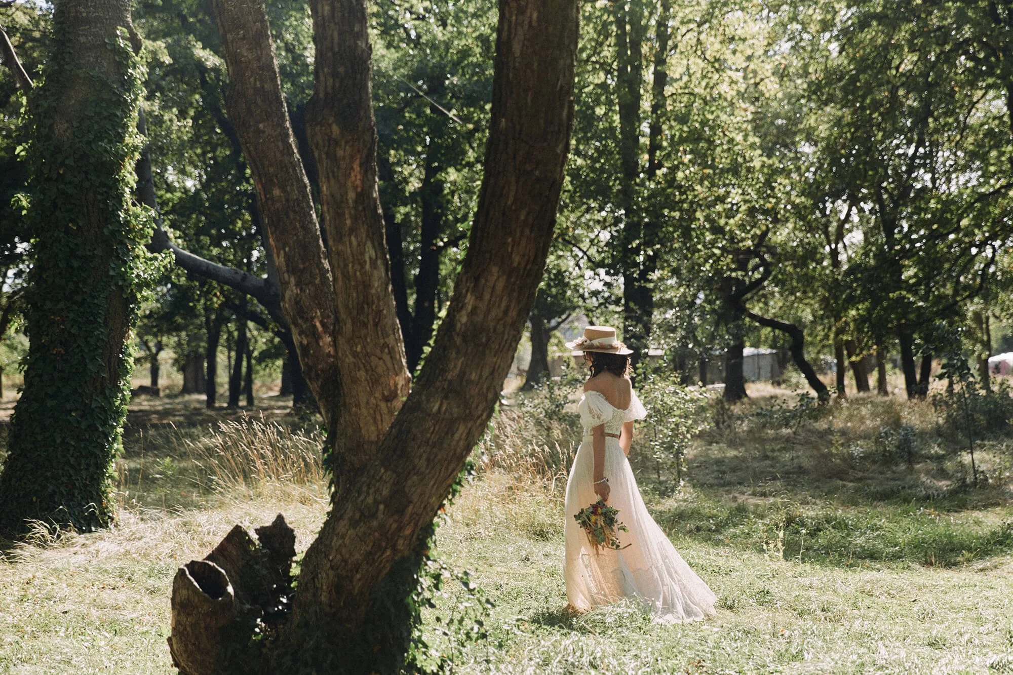 Romantic bridal walk in forest setting