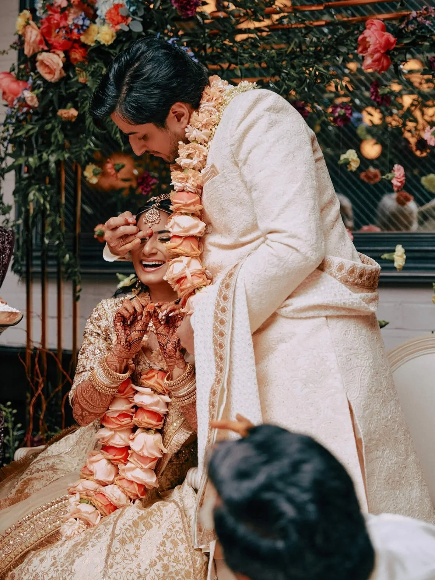 Bride and groom during a traditional Indian wedding ritual
