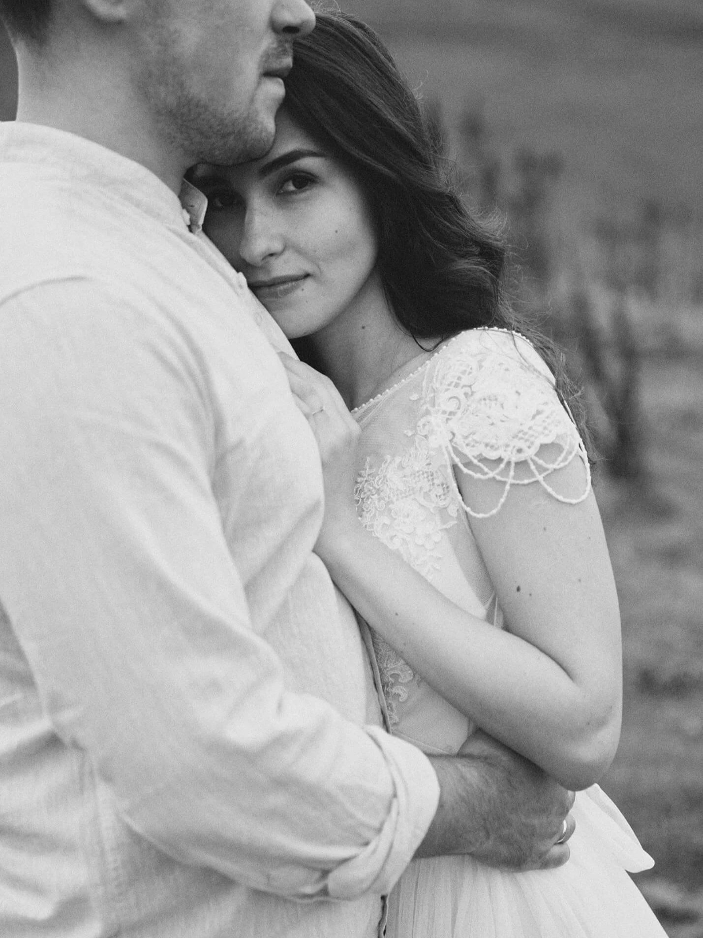 Engagement shoot: couple black and white portrait amid mountain scenery