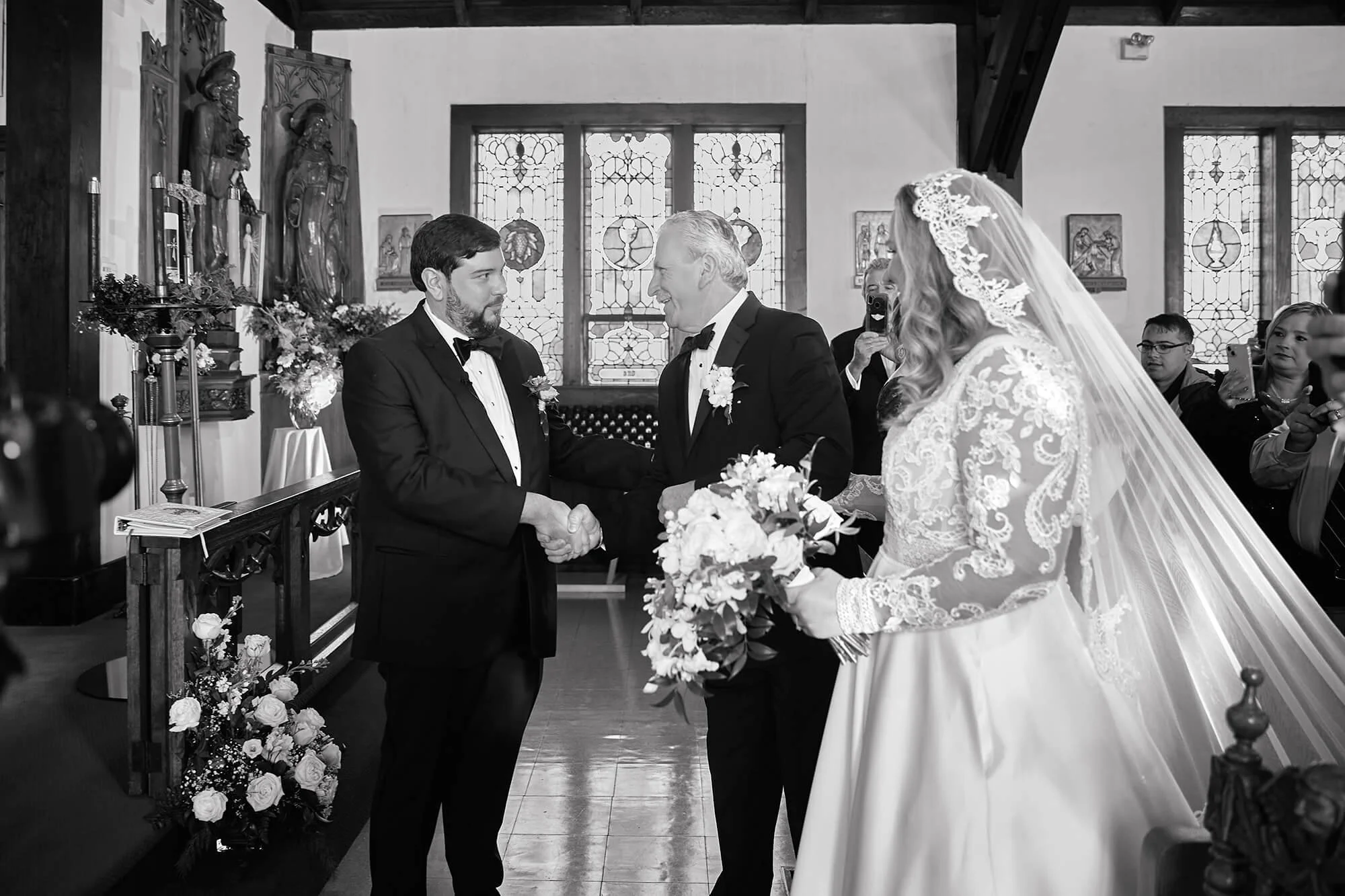 father-giving-away-bride-to-groom.jpg