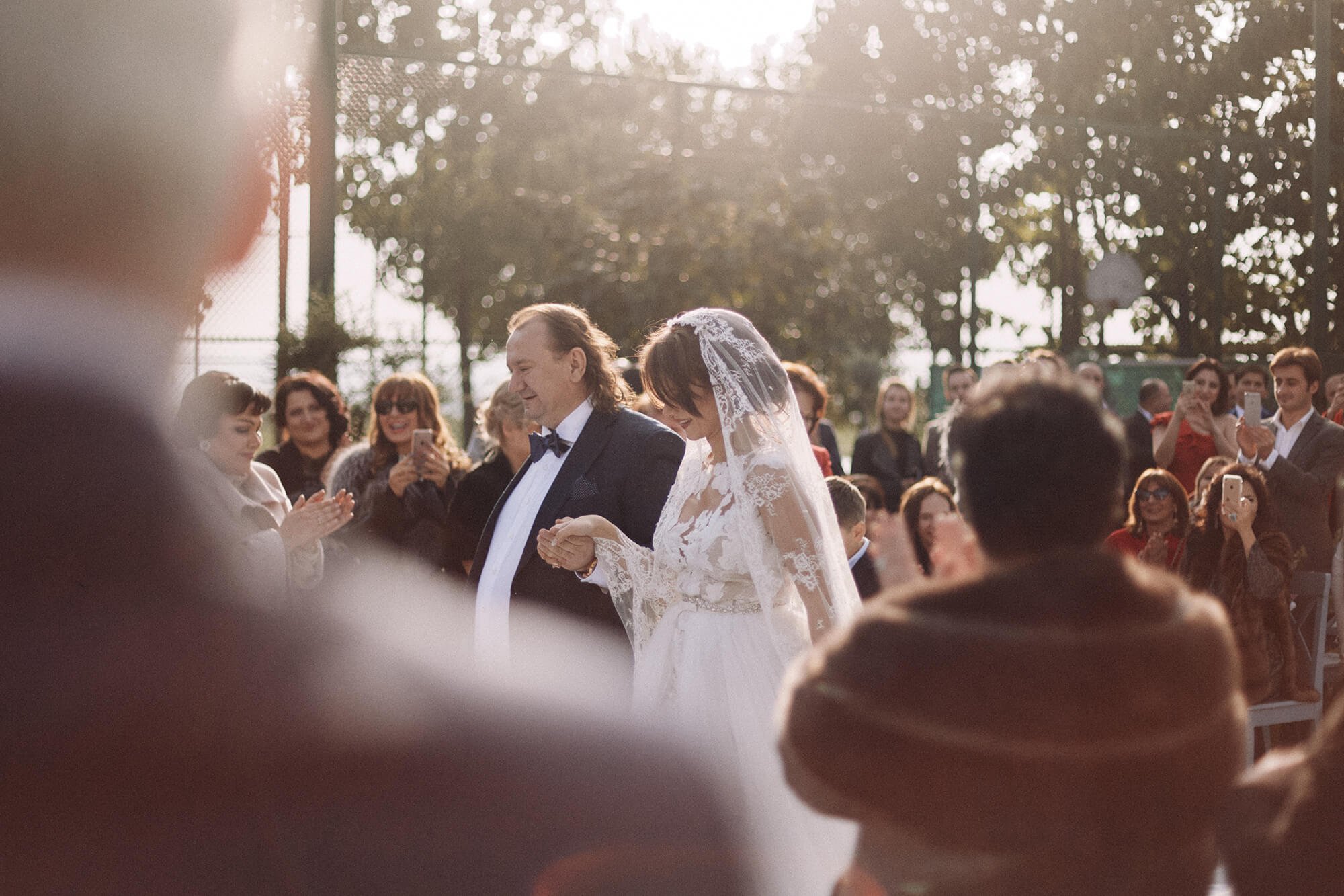Bride walking with her father at the ceremony