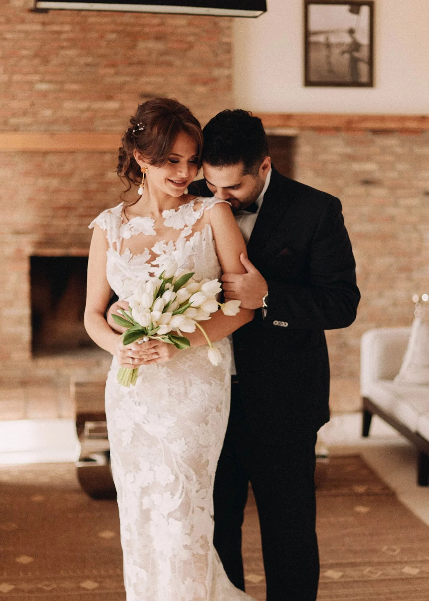 Romantic bridal and groom portrait with bouquet