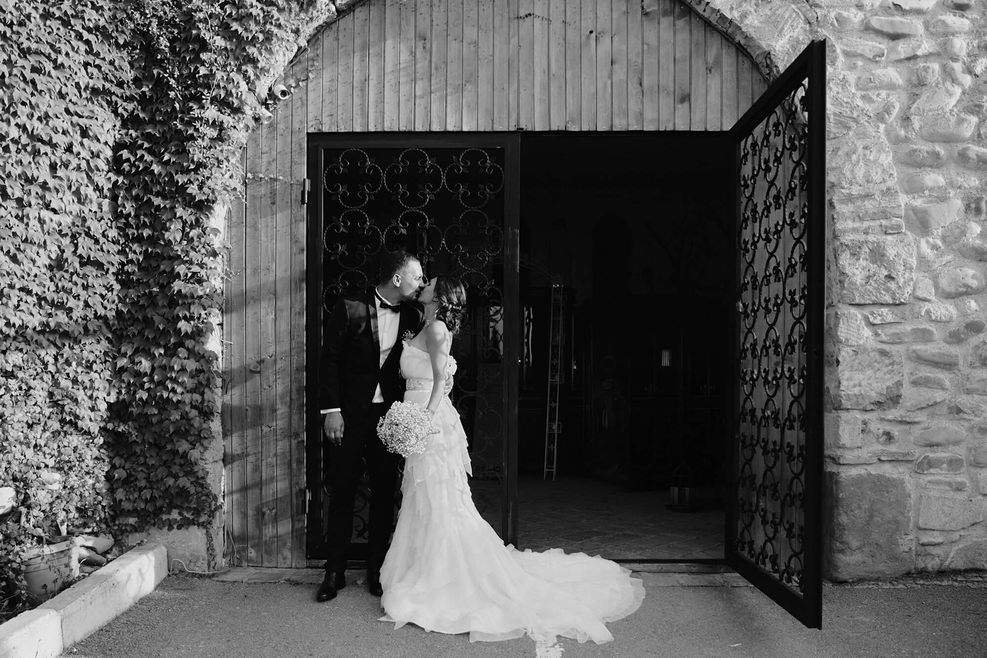 Bride and groom posing together after the wedding ceremony