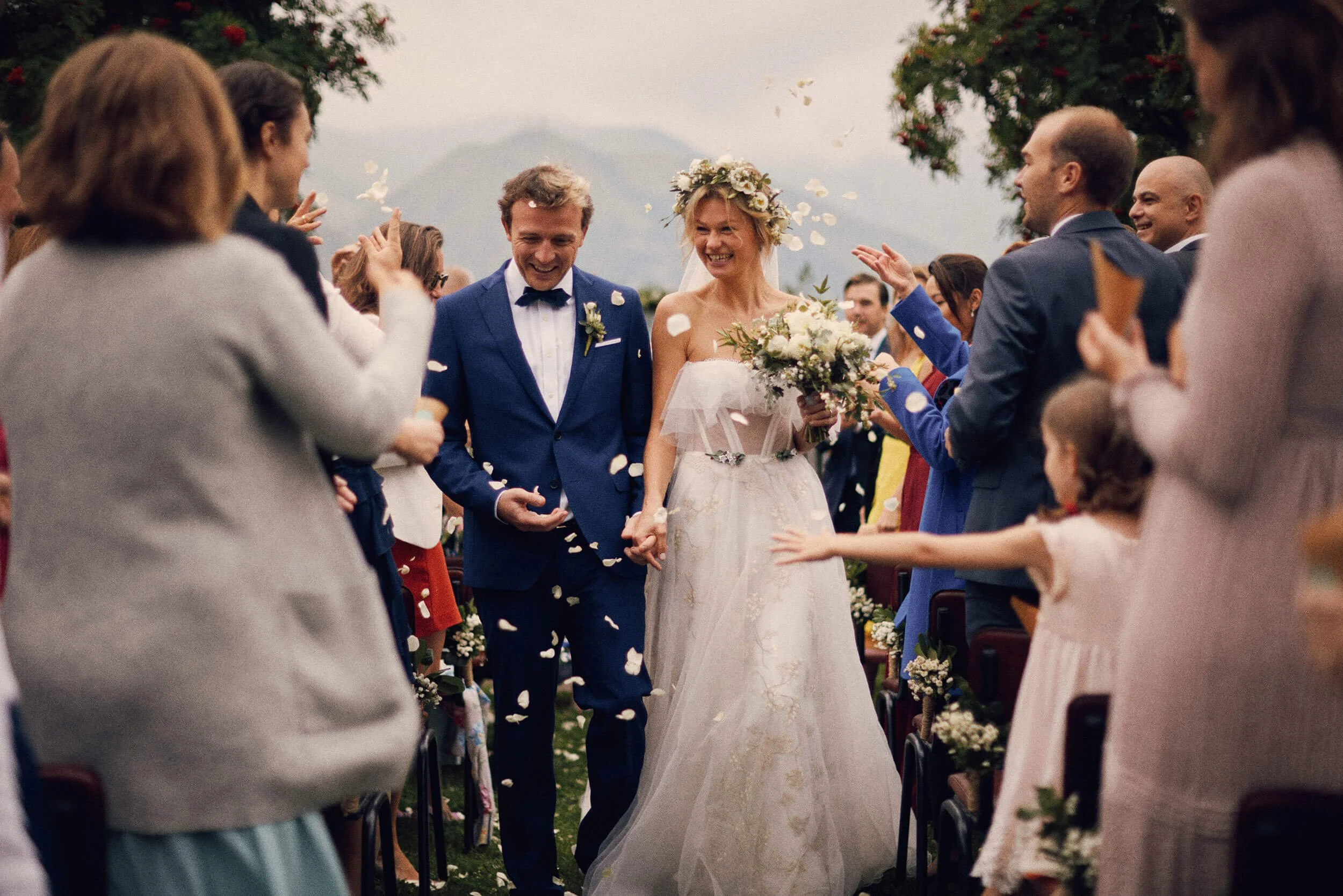 Couple walking down the aisle together
