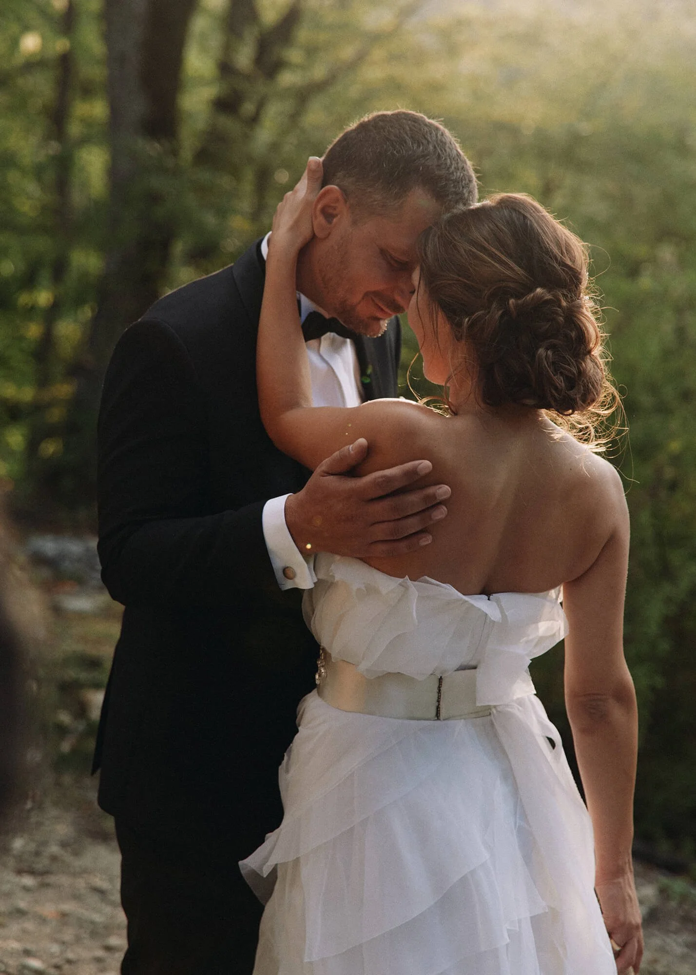 Newlyweds sharing a hug after dancing
