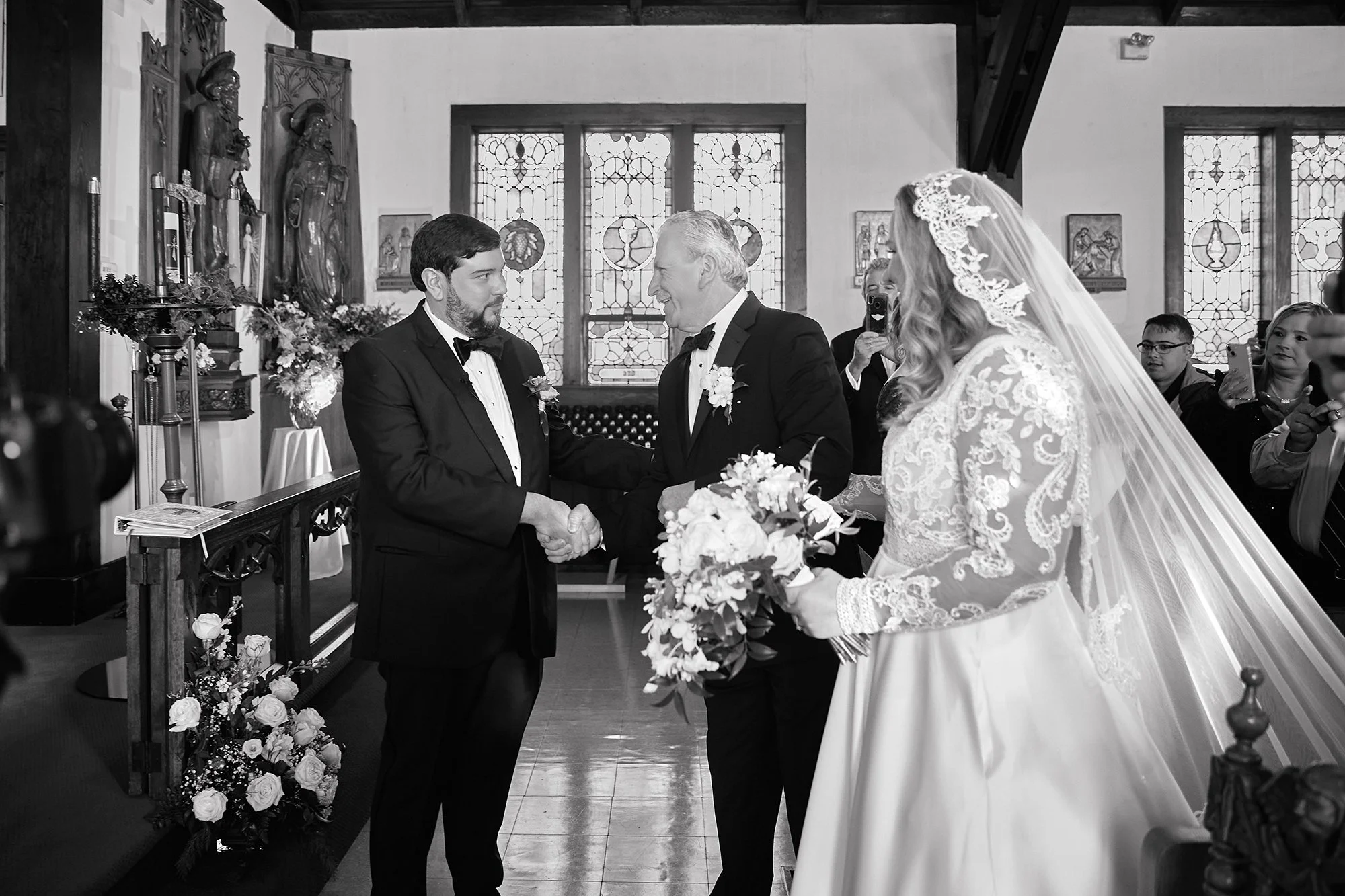 father-giving-away-bride-to-groom.jpg