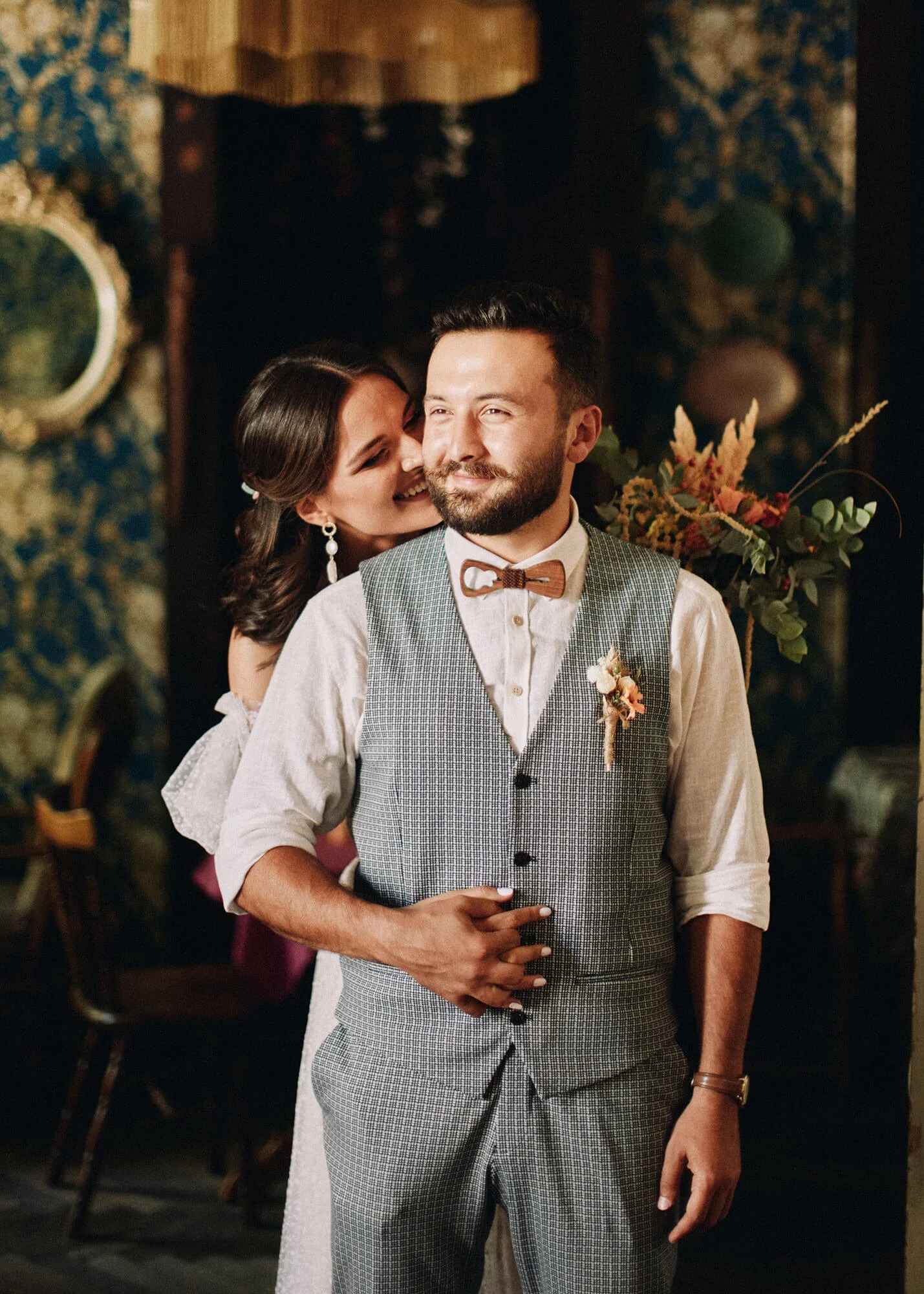 Romantic couple portrait inside an old café