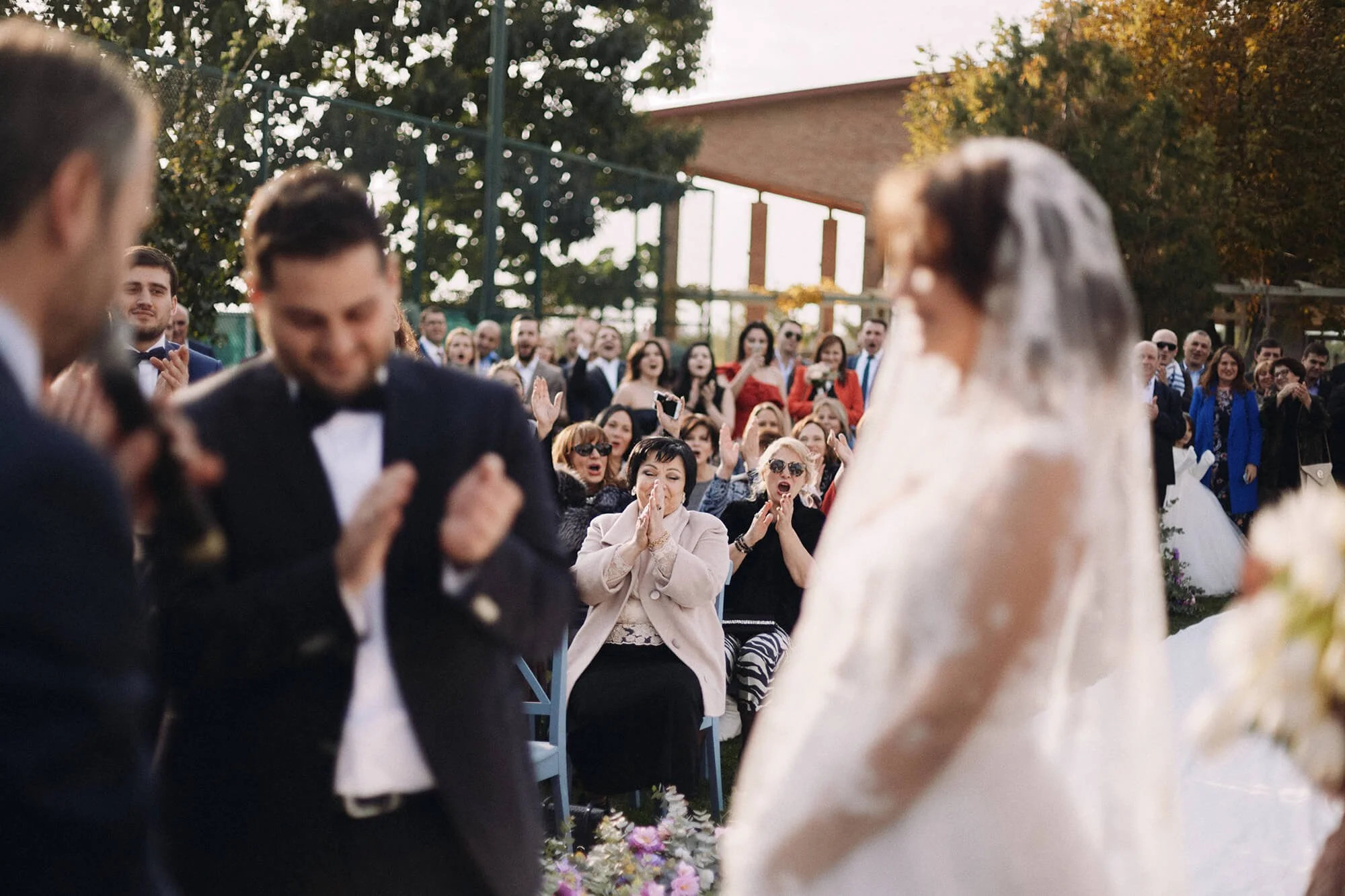 Friends and family celebrating the couple at the ceremony