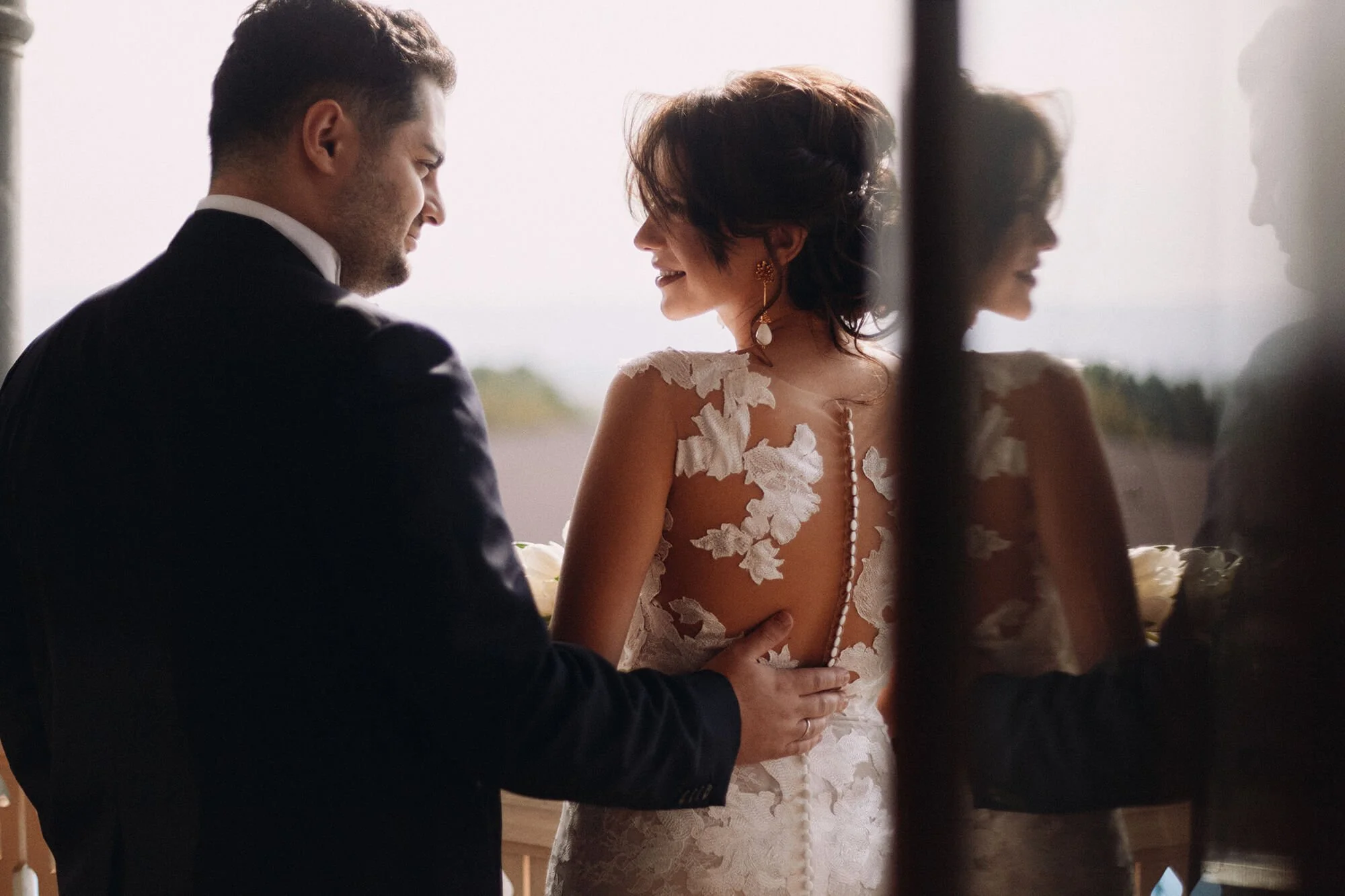 Bride and groom sharing a candid laugh