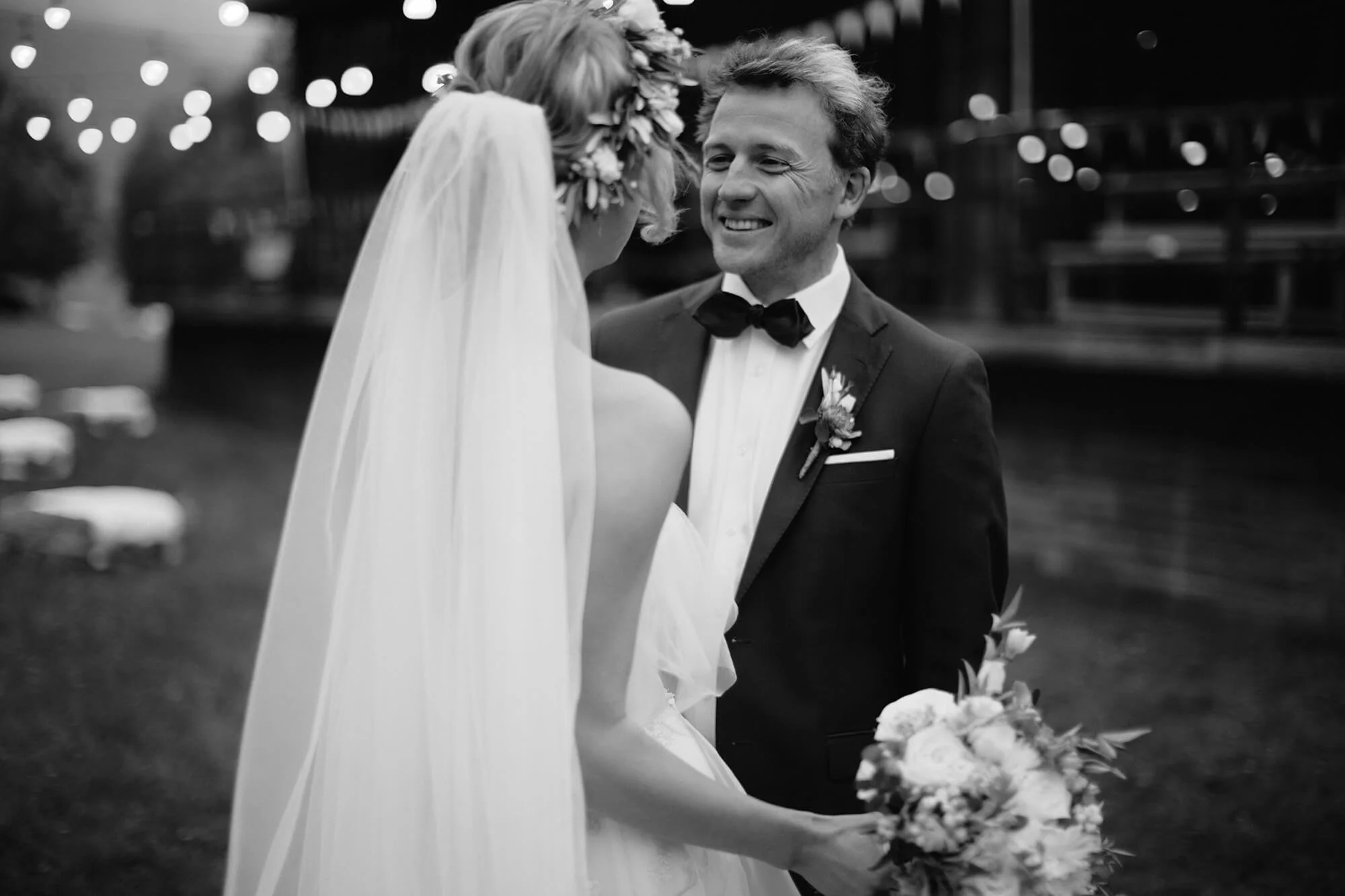 bride groom smiling after ceremony outdoors