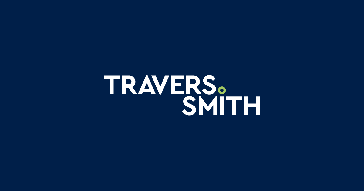 Company logo for Travers Smith on a dark blue background with white text and a small green circle.