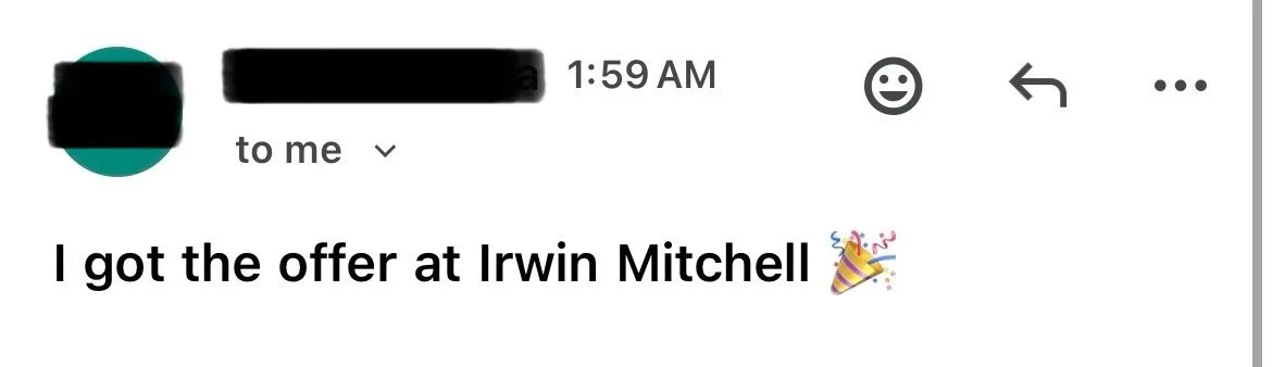 Screenshot of an email message saying 'I got the offer at Irwin Mitchel' with a party popper emoji.