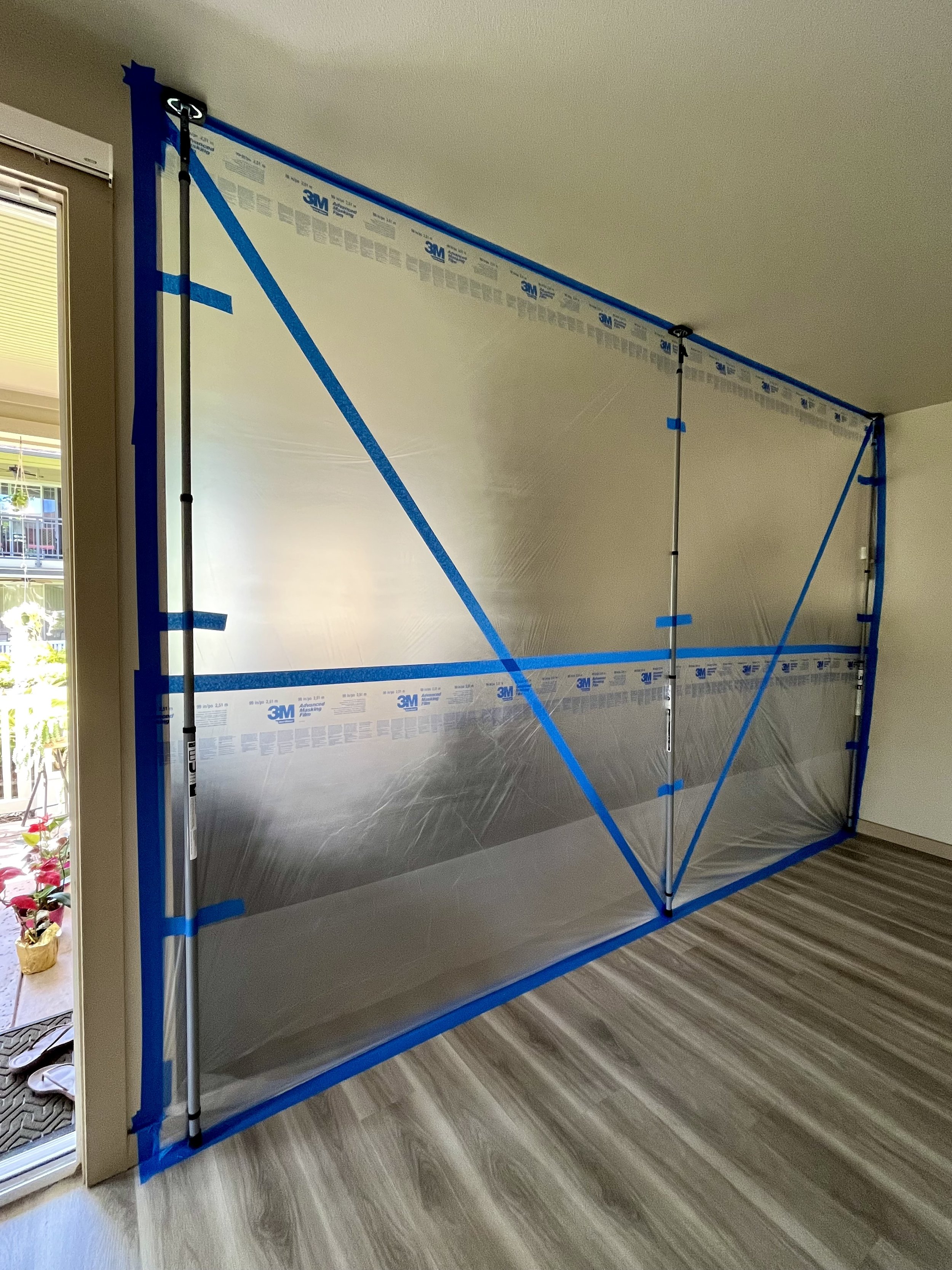 Reinforcement poles added for a tight seal, floor to ceiling, wall to wall. Protecting all living, entertainment, and dinning room furniture.