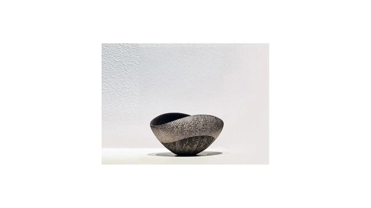 Iguchi Daisuke (b. 1975). Silver glazed tea bowl (2025), ceramic clay, metal oxide, clay ash, hulled ash, silver, H 8.5 cm x W 15.5 cm. 