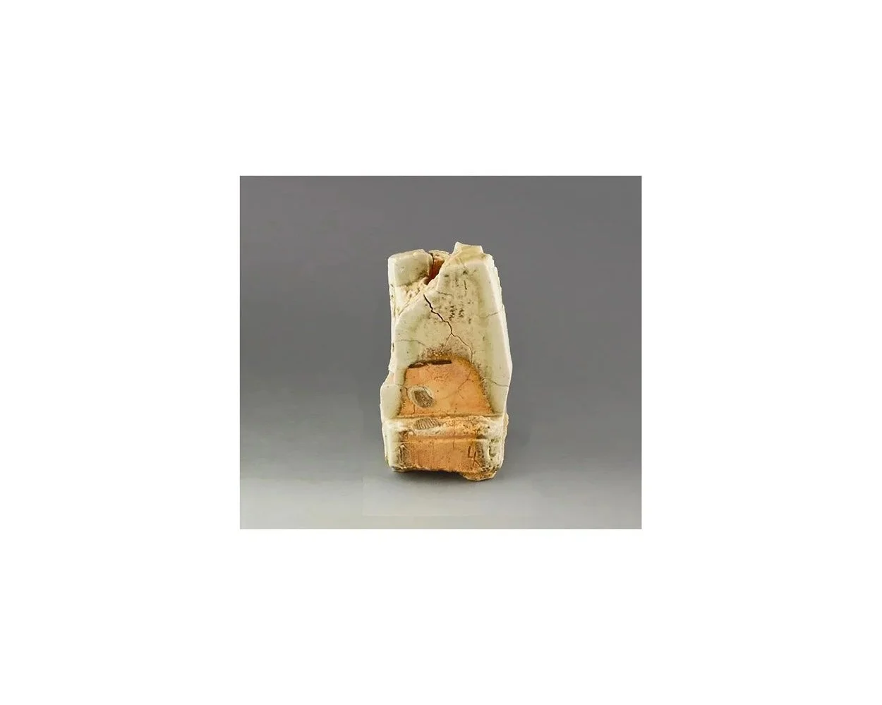 Lucien Koonce. Sculptural vessel/vase, hand carved stoneware clay, wood fired with natural ash glaze to cone 12, H 14 x W 7.6 cm. 