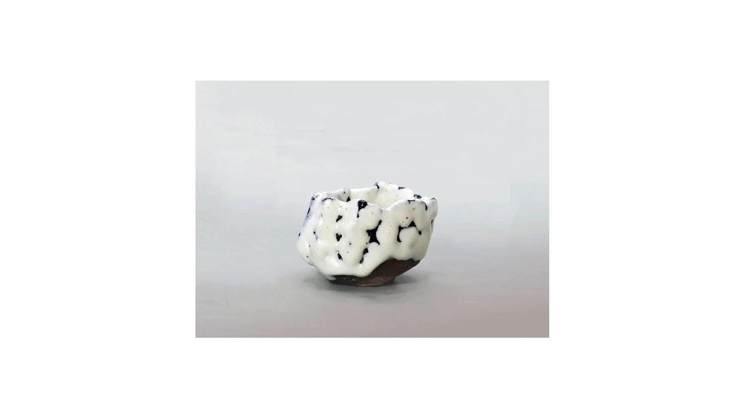 Nishihata Tadashi (b. 1948). Straw-white sake cup, Tamba ware, H 5.6 cm x W 8.2 cm. 