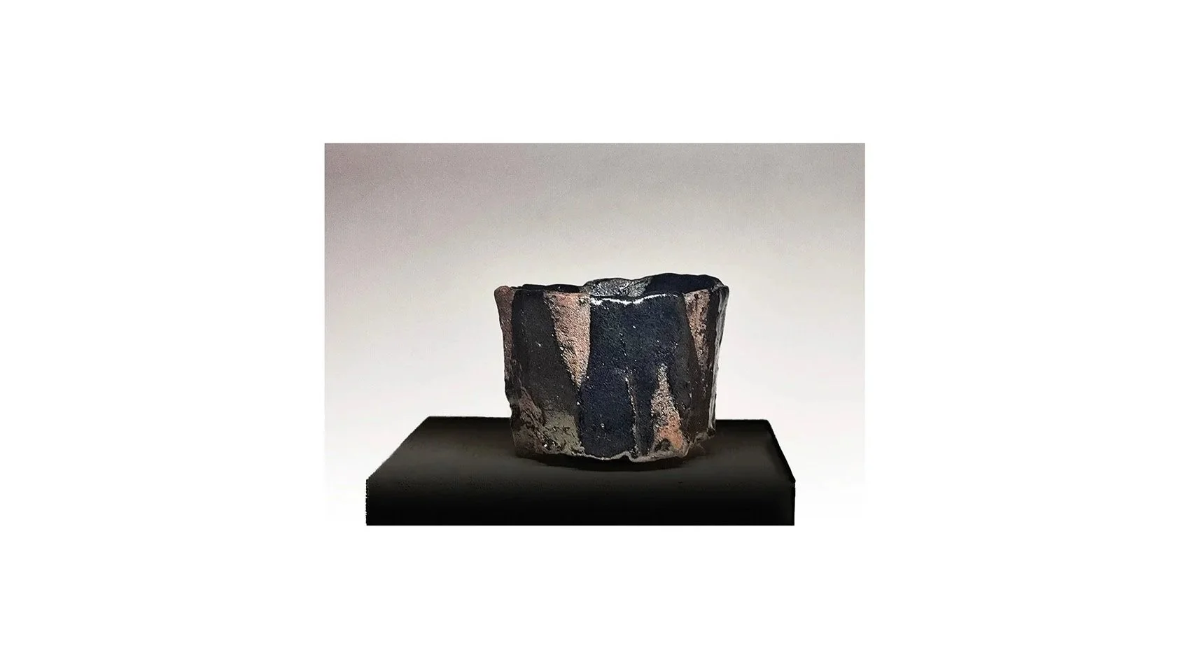 Yanashita Hideki (b. 1967). Black sake cup, hand-carved, fired by Raku technique, H 5.4 cm x W 6.8 cm. 