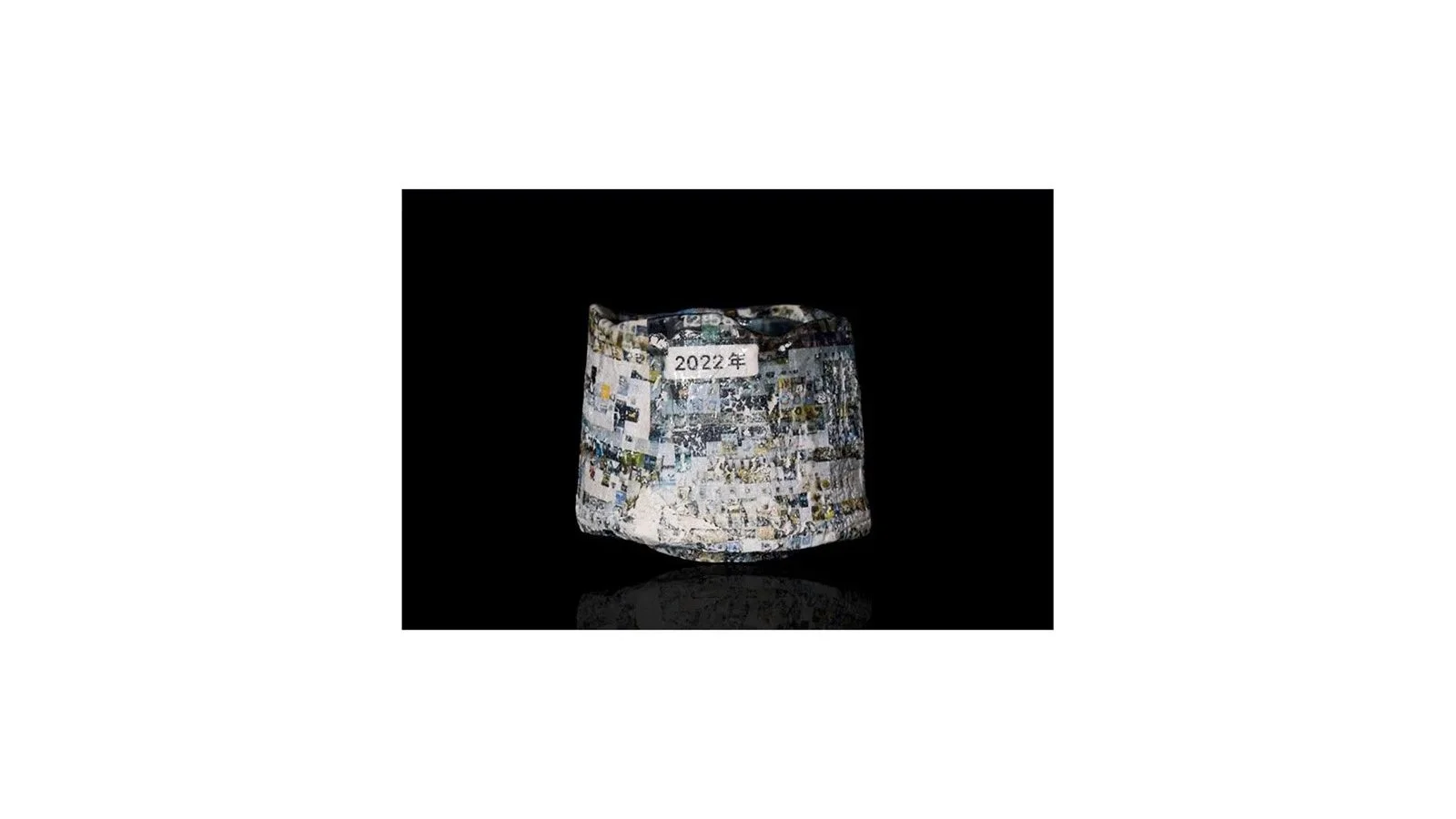 Isezaki Youtaro (b. 1995). Tea bowl with digital image transfer prints, Bizen ware, H 10.3 cm x W 13 cm. 