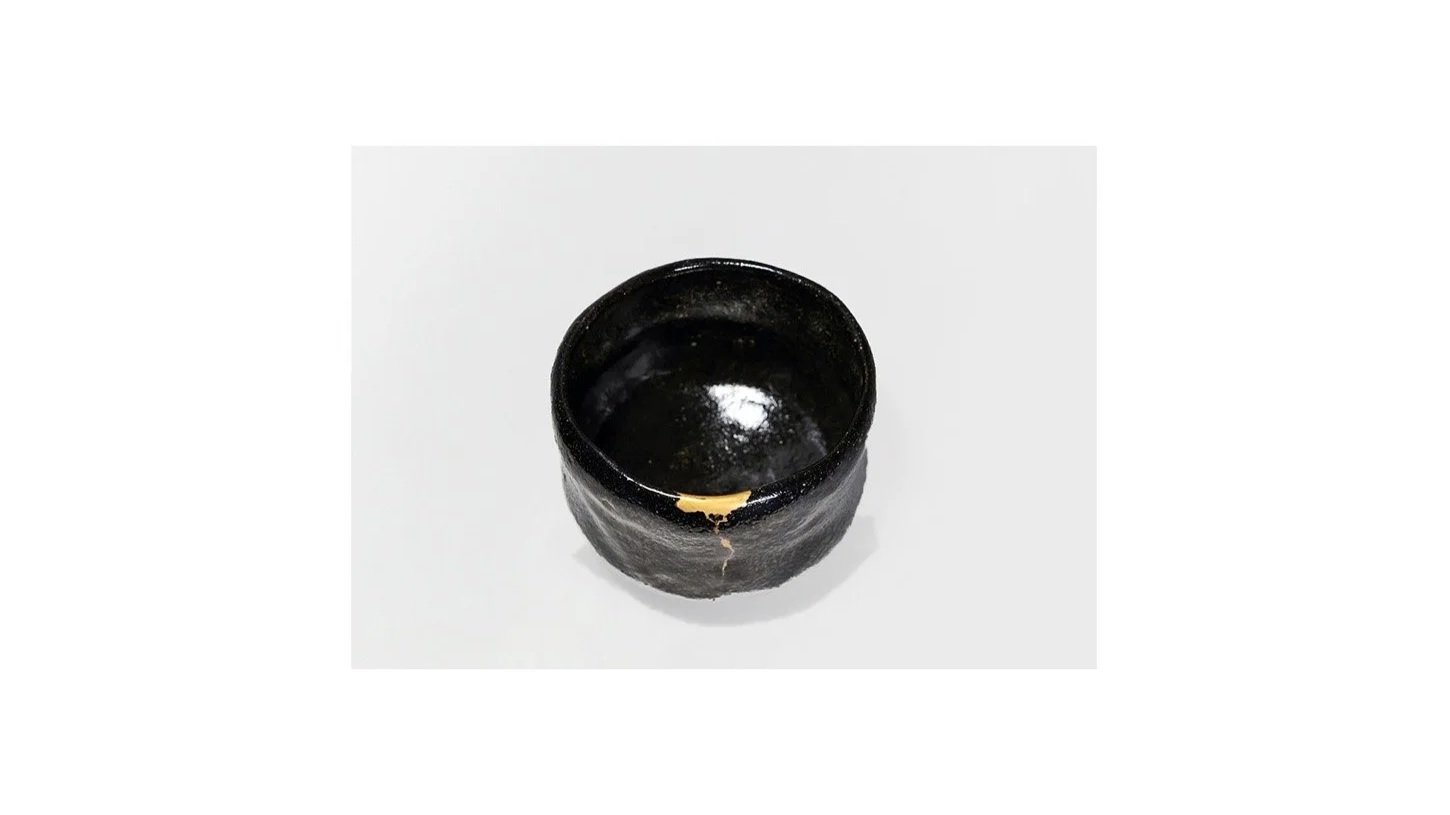 Artist unknown. Black Raku tea bowl with Kintsugi (gold and lacquer) repair, Edo period (1603-1868), H 8 cm x W 10 cm. 