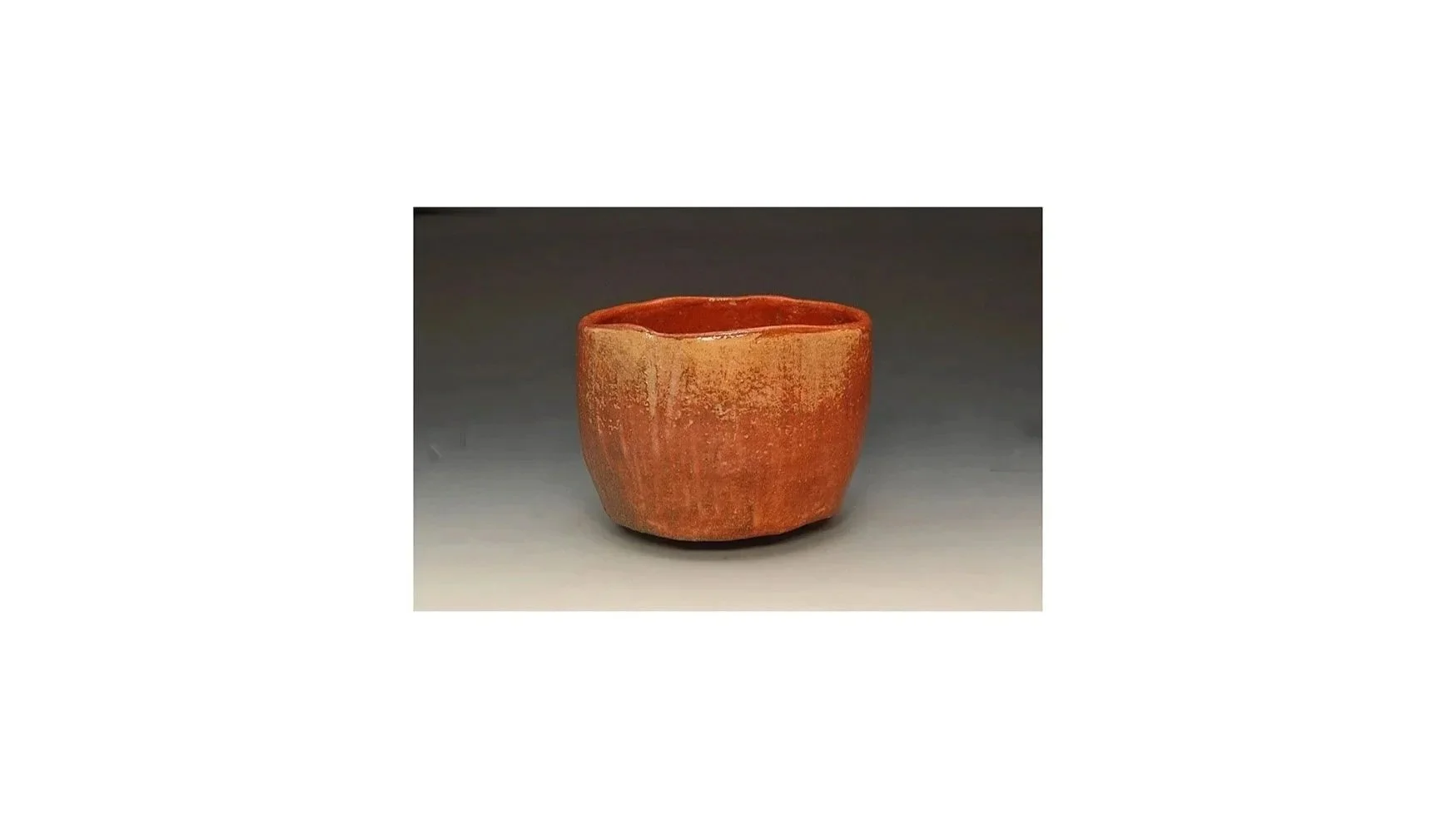 Red tea bowl by Ho'nami Koetsu (1558-1637), Raku ware, H 9 cm x W 11.3 cm. Copy of the original by a master Kyoto potter.  