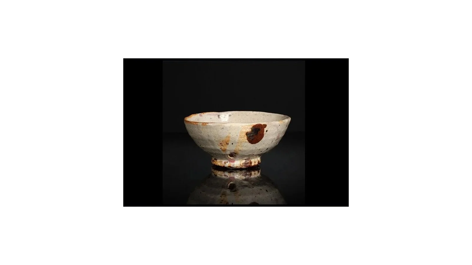 Kudo Mahito (b. 1958). Kohiki tea bowl with abstract iron painting, H 6.8 cm x W 14.5 cm.