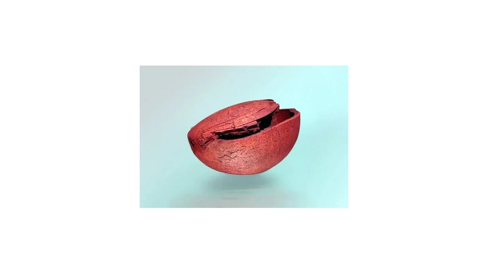 Ogawa Machiko (b. 1946), red vessel with torn and uneven rim, 2000. Stoneware with red iron-oxide glaze, W 26 x D 22 x H 12.5 cm.