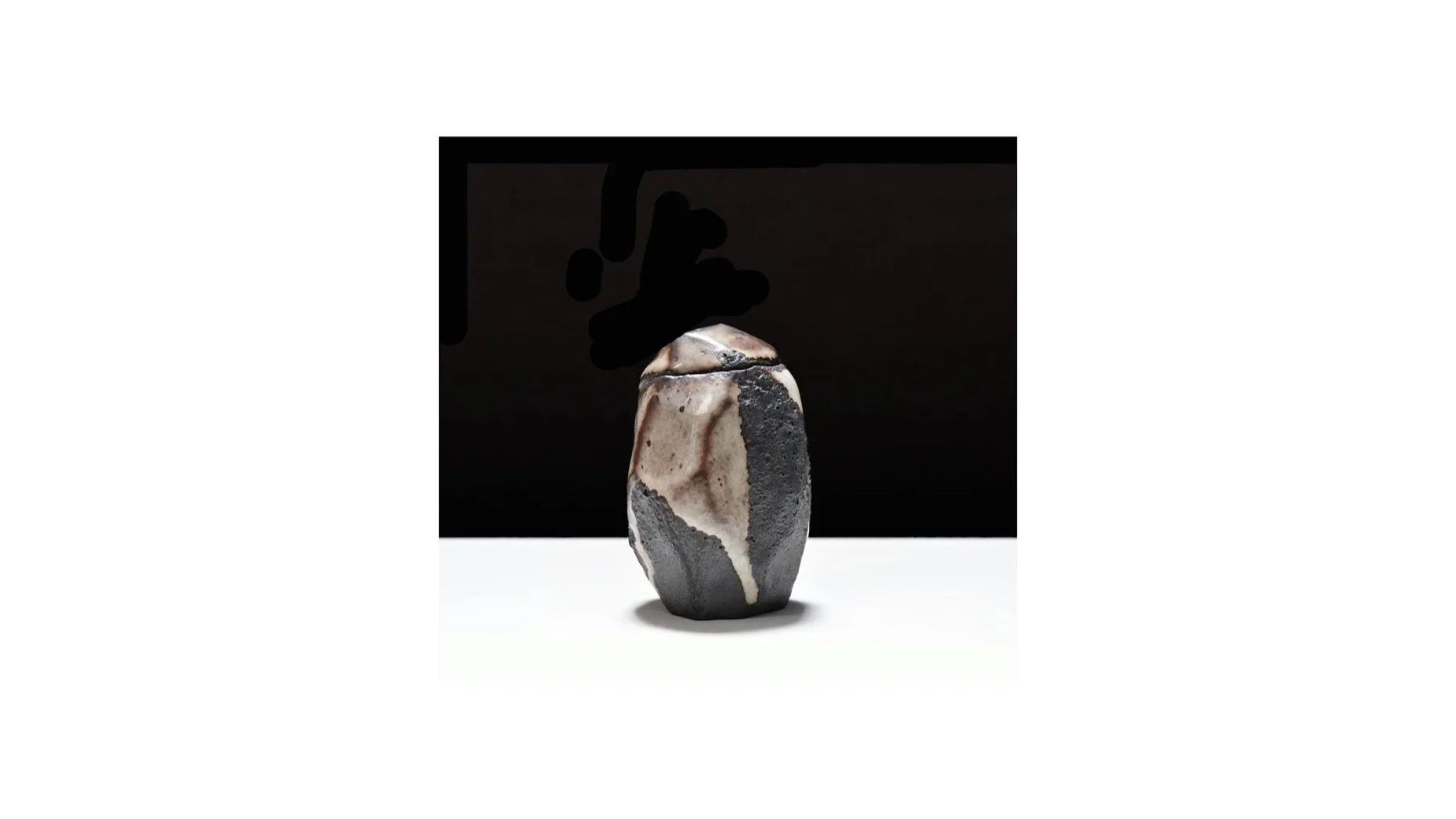 Robert Fornell. Black Shino tea caddy, stoneware with Shino glaze, reduction-fired, H 10 cm x W 6 cm. 