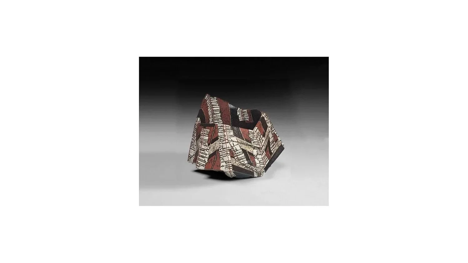 Hayato Sawada (b. 1978), Hand-built faceted vessel with incised design and multi-color slips, Kasama ware, H 11.5 cm x W 12-13 cm.