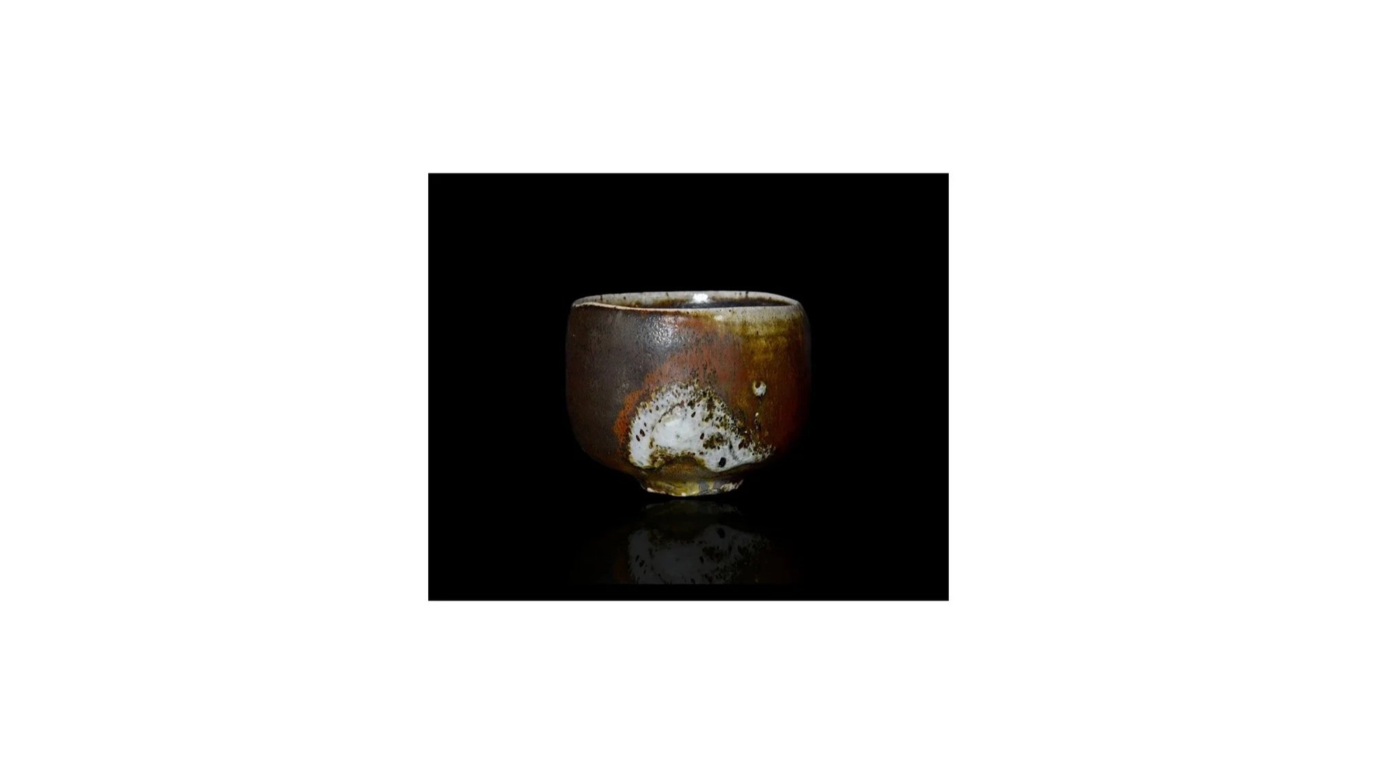 Daniel Seko (b. 1978), Black yohen tea bowl, stoneware with feldspar glaze, H 8.5 cm x W 11 cm.