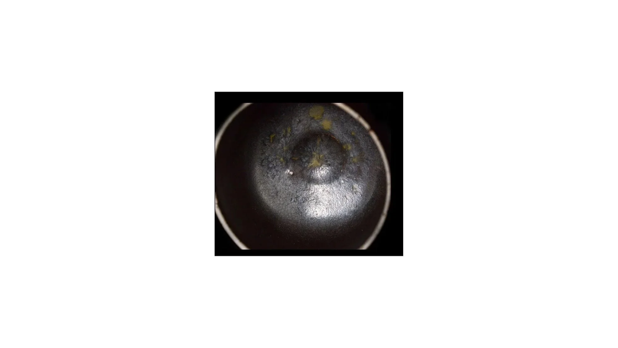 Daniel Seko (b. 1978), Black yohen tea bowl, stoneware with feldspar glaze, H 8.5 cm x W 11 cm.