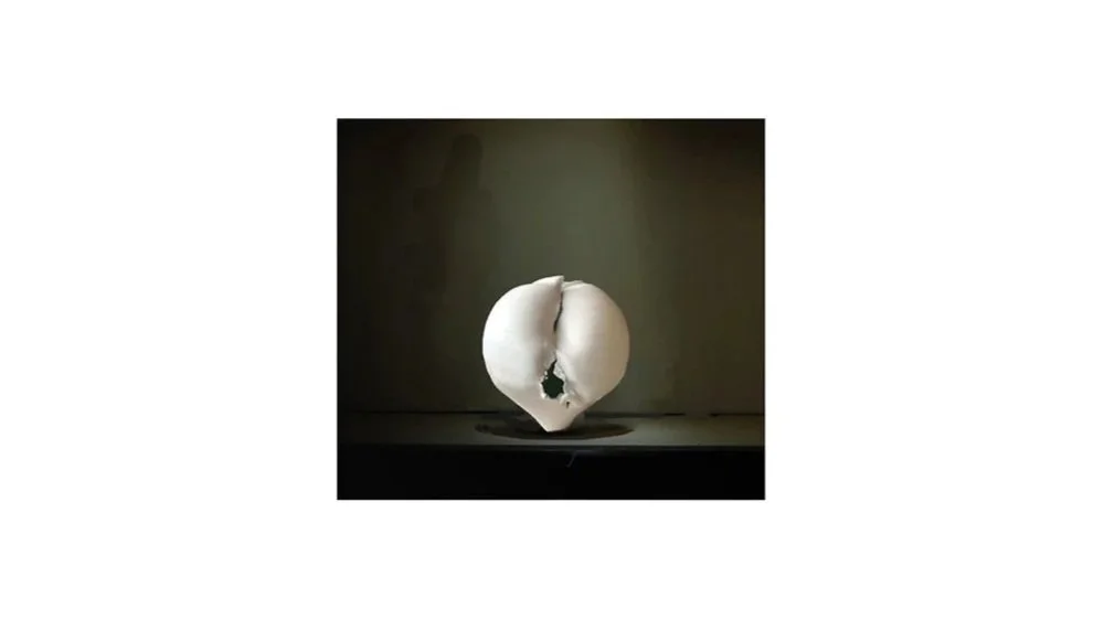 Takuya Murata (b. 1982), Torn vessel, white porcelain with seihakuji glaze in the interior, hand-built, fired in a gas kiln, H 17 cm x W 16 cm.   