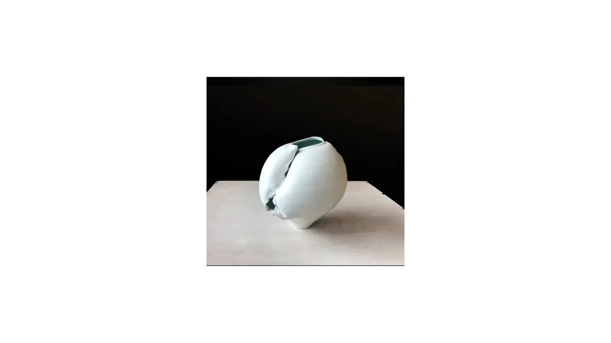 Takuya Murata (b. 1982), Torn vessel, white porcelain with seihakuji glaze in the interior, hand-built, fired in a gas kiln, H 17 cm x W 16 cm.   