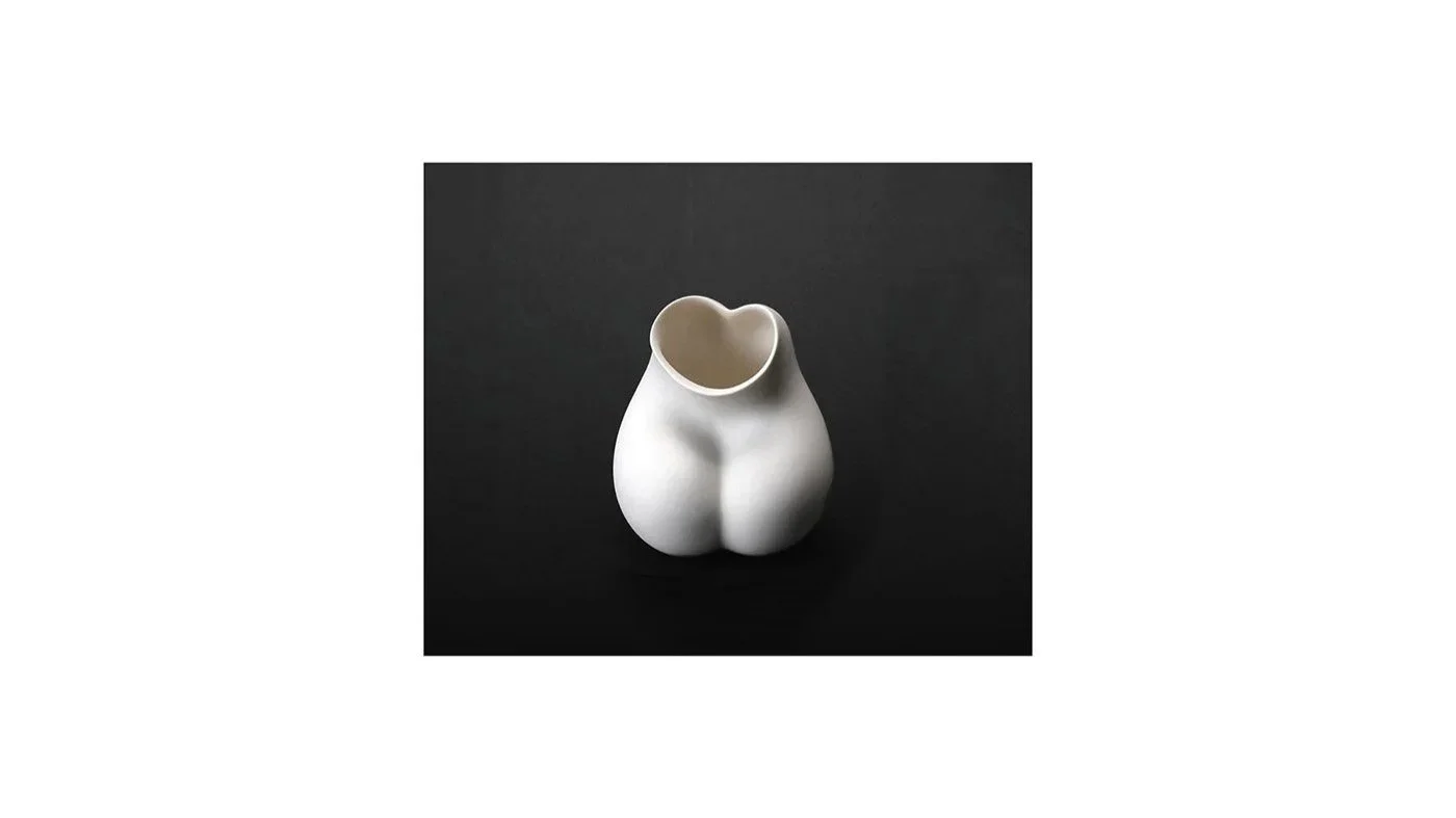 OHE Shiori (b. 1985), Vessel in the form of an abstract nude figure, matte porcelain, H 14 cm x W 12 cm.