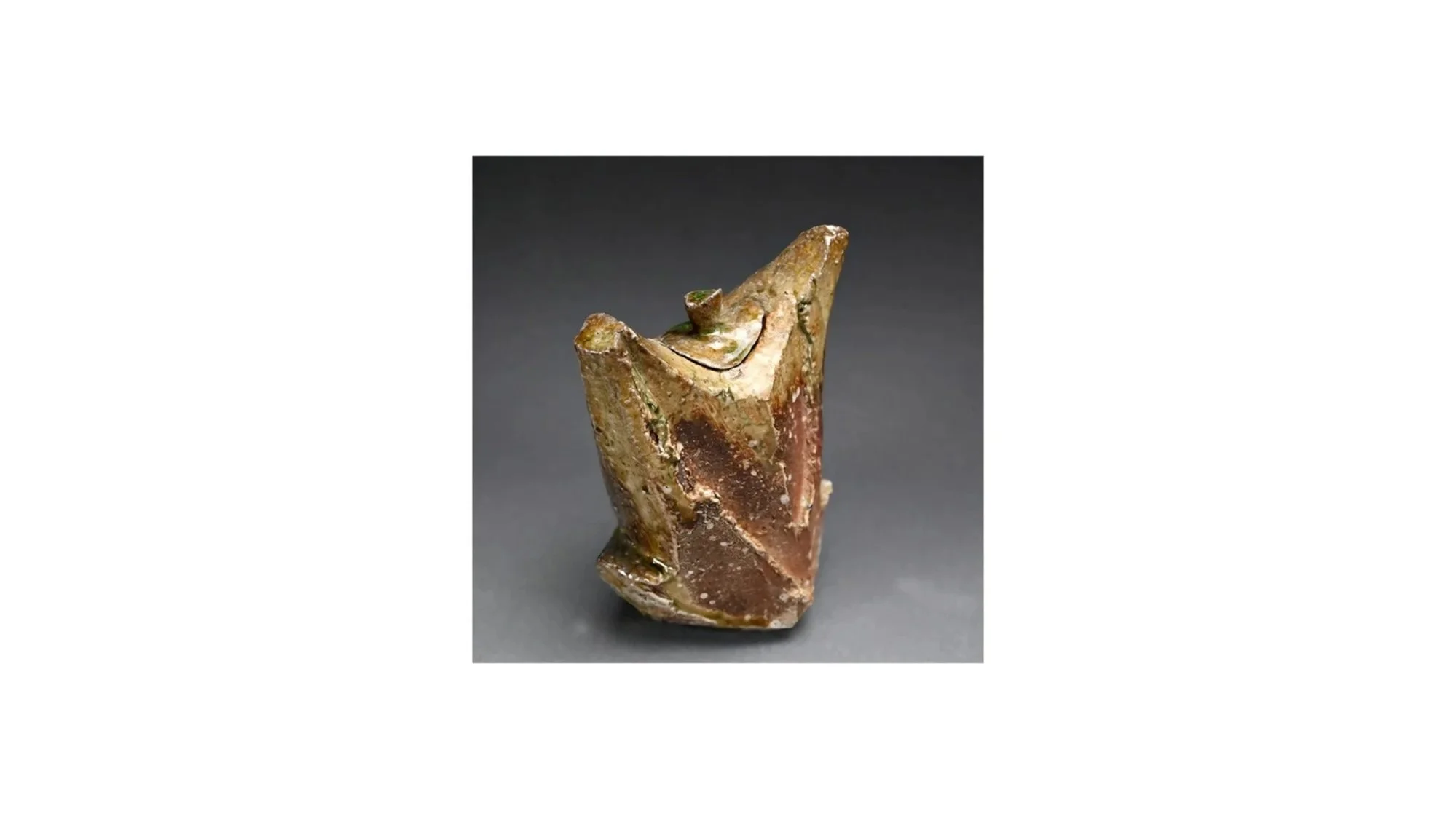 Atarashi Manabu (b 1973), Vessel in the shape of a dancer, hand-built Iga ware, wood-fired unglazed in an anagama kiln, H 21 cm x W 16 cm.