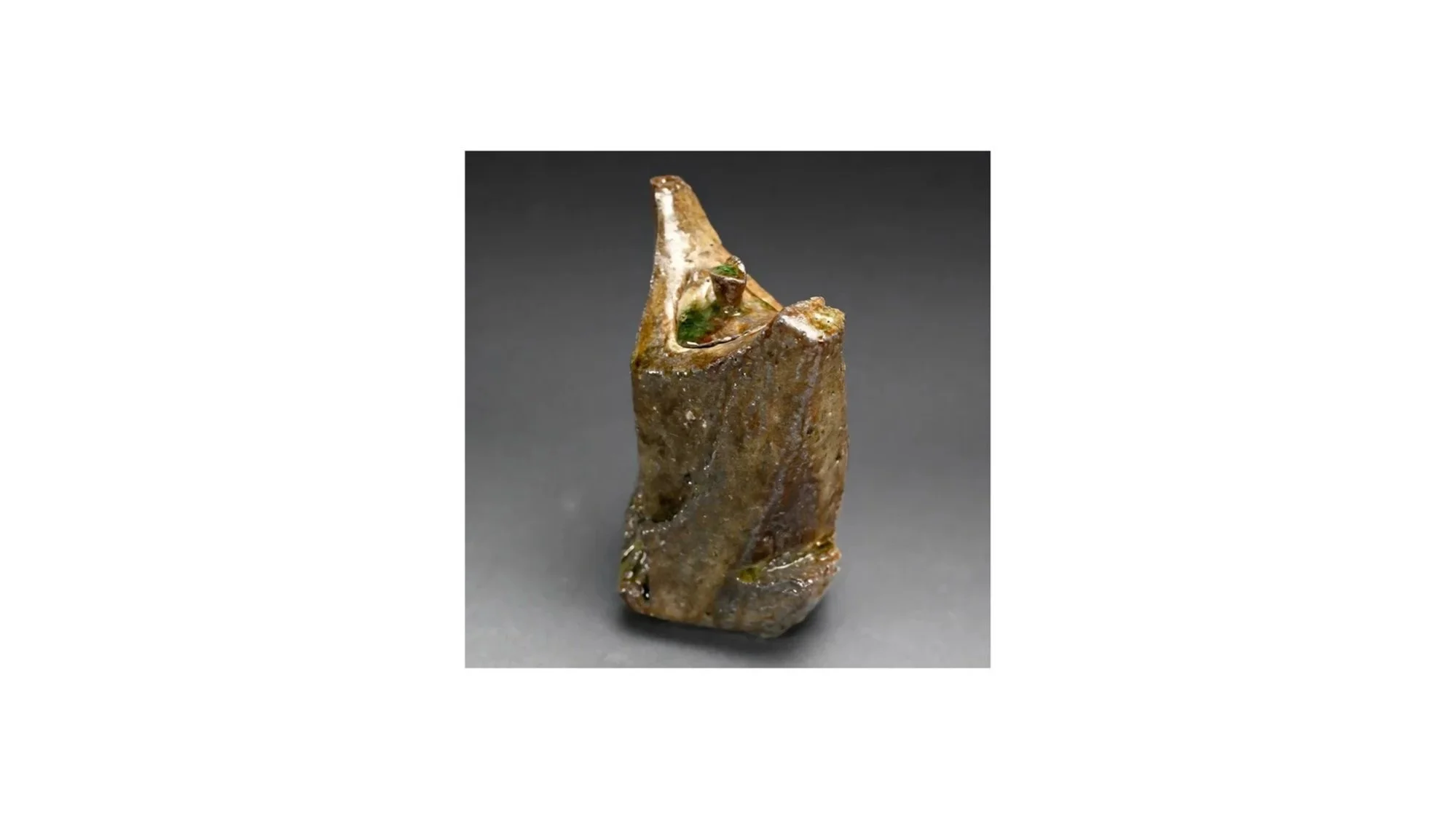 Atarashi Manabu (b 1973), Vessel in the shape of a dancer, hand-built Iga ware, wood-fired unglazed in an anagama kiln, H 21 cm x W 16 cm.