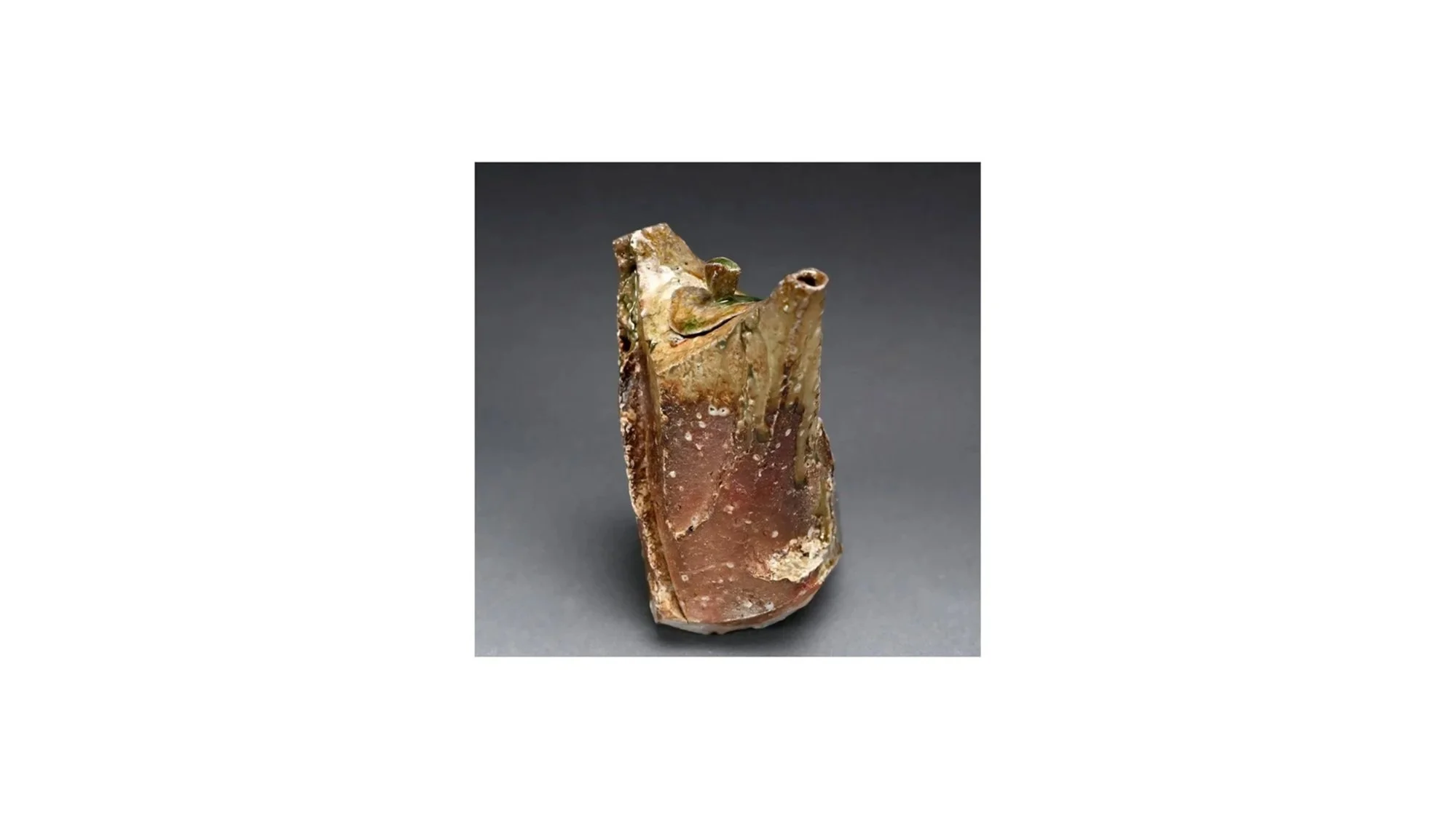 Atarashi Manabu (b 1973), Vessel in the shape of a dancer, hand-built Iga ware, wood-fired unglazed in an anagama kiln, H 21 cm x W 16 cm.